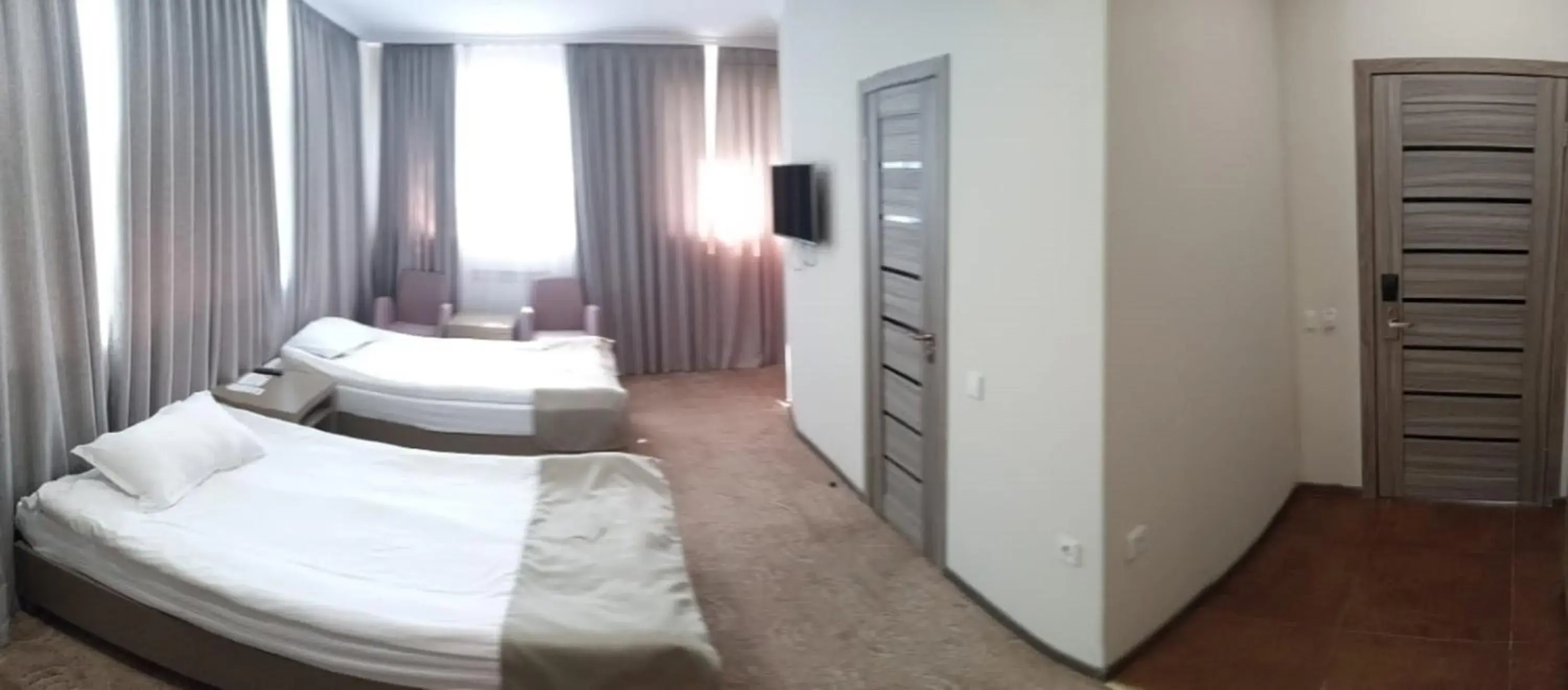 Photo of the whole room, Bed in Renion Hotel