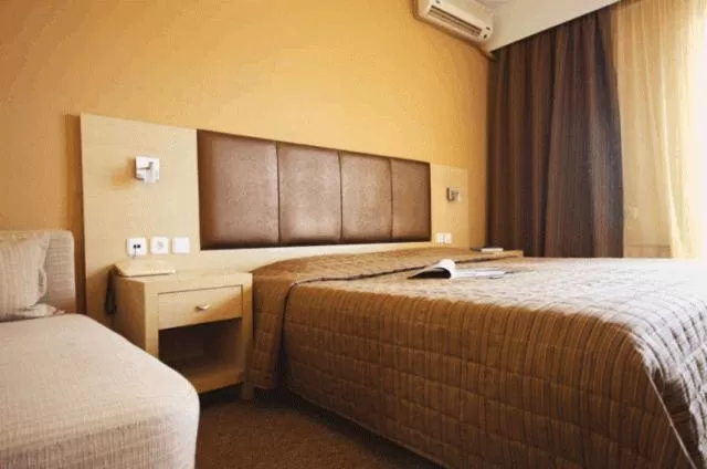 Bed in Orpheus Hotel