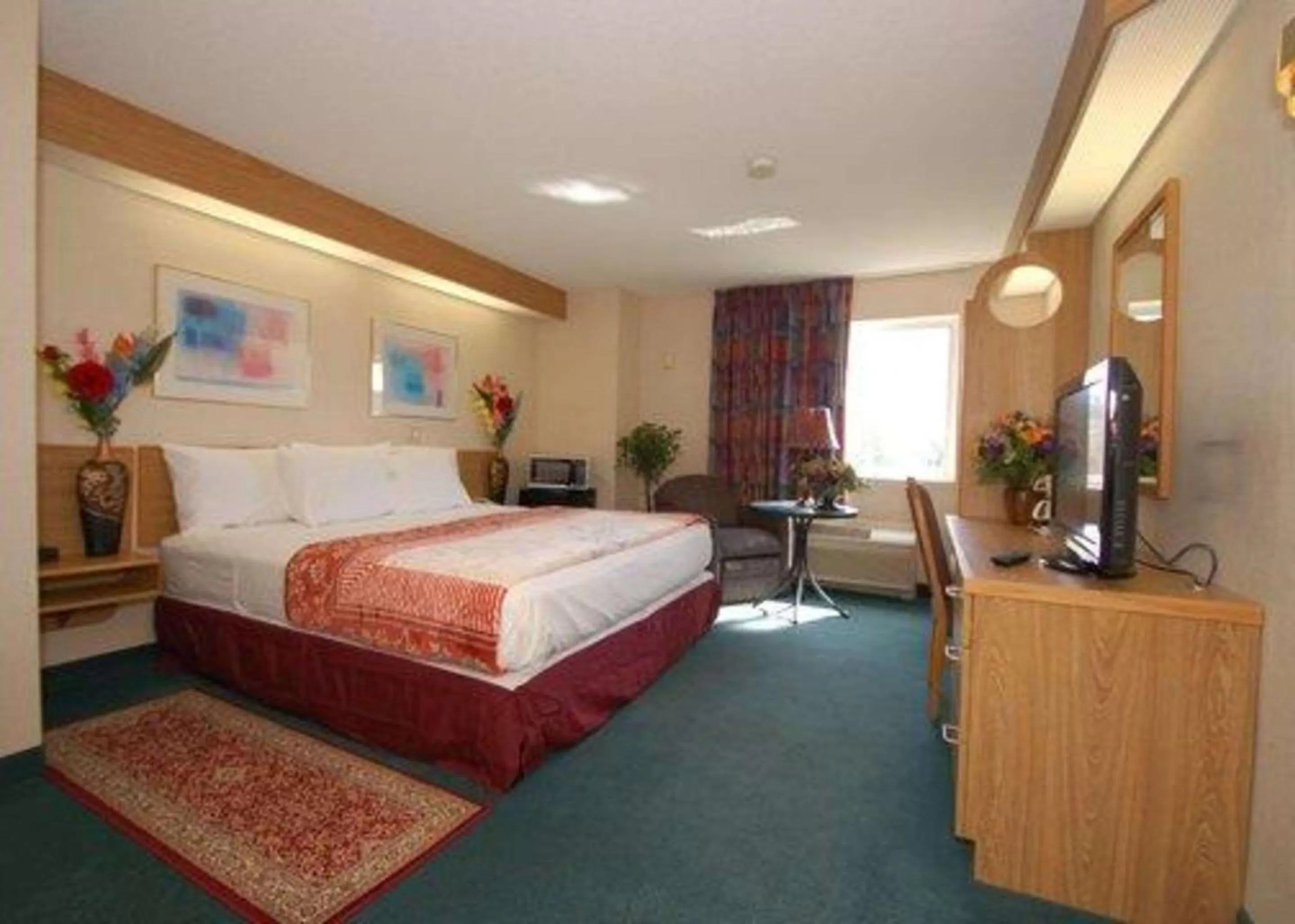 Photo of the whole room, Bed in Rodeway Inn Willington North