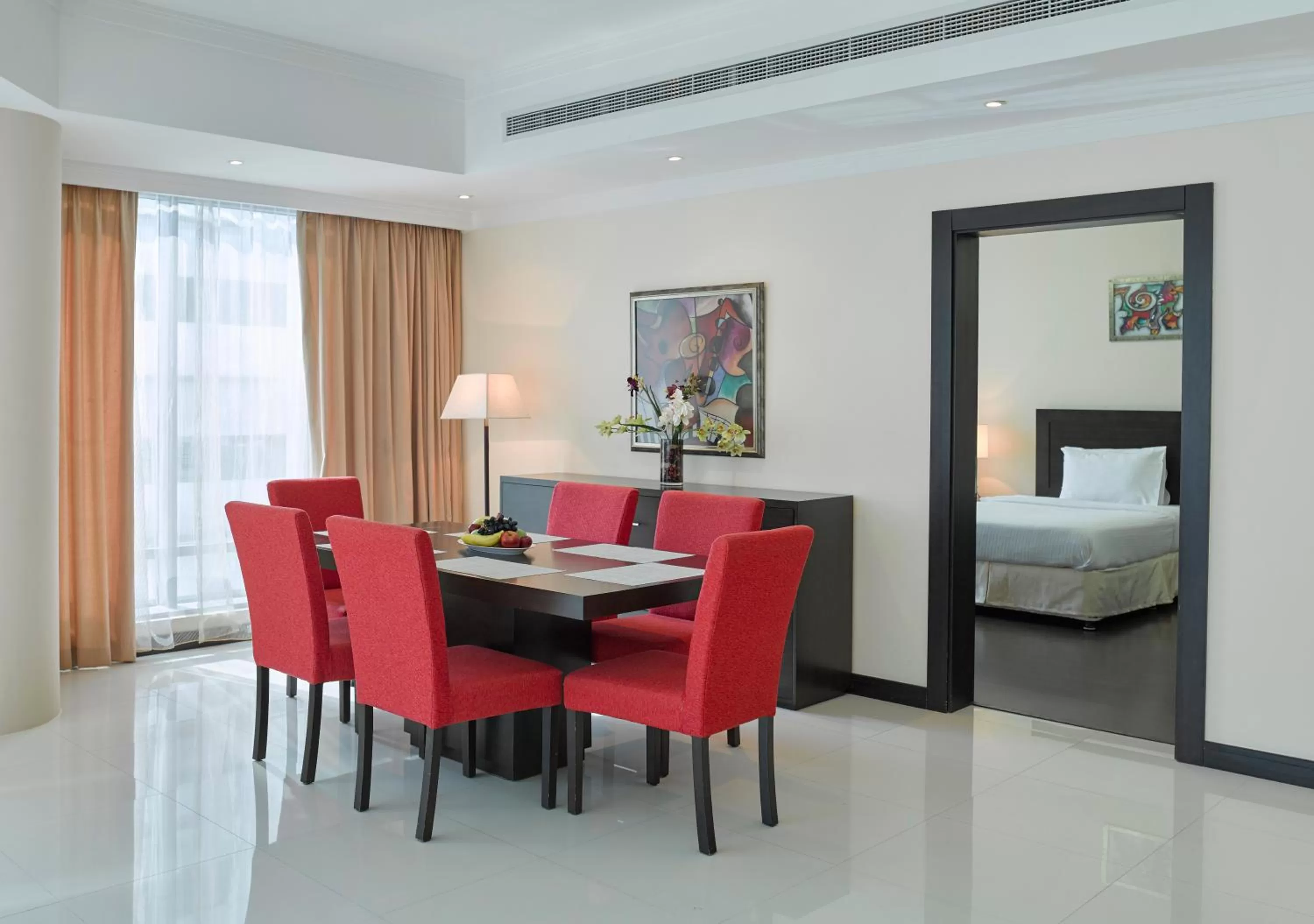 Dining area, Bed in Tulip Hotel & Suites