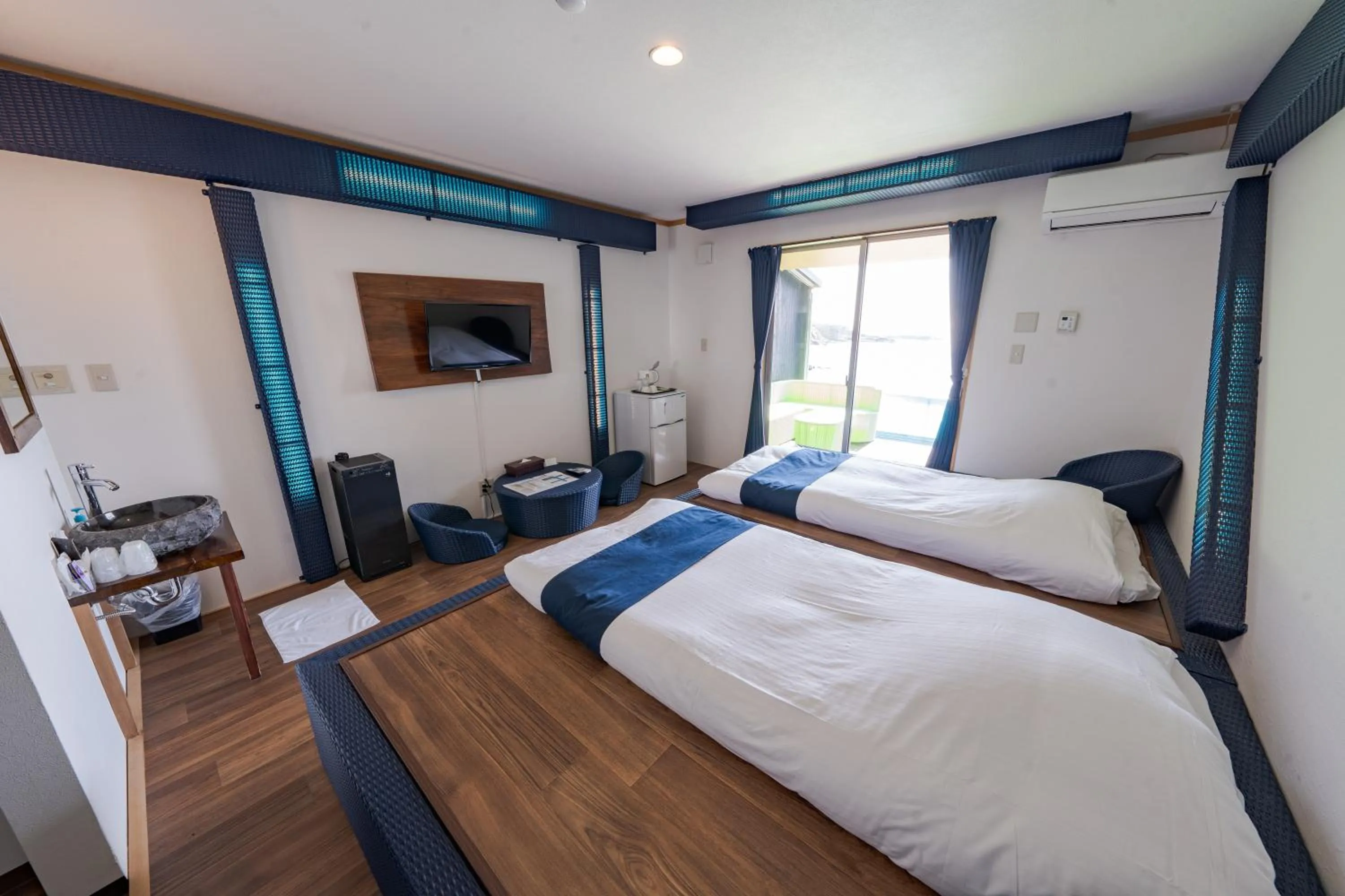 Bed in XYZ Private Spa and Seaside Resort