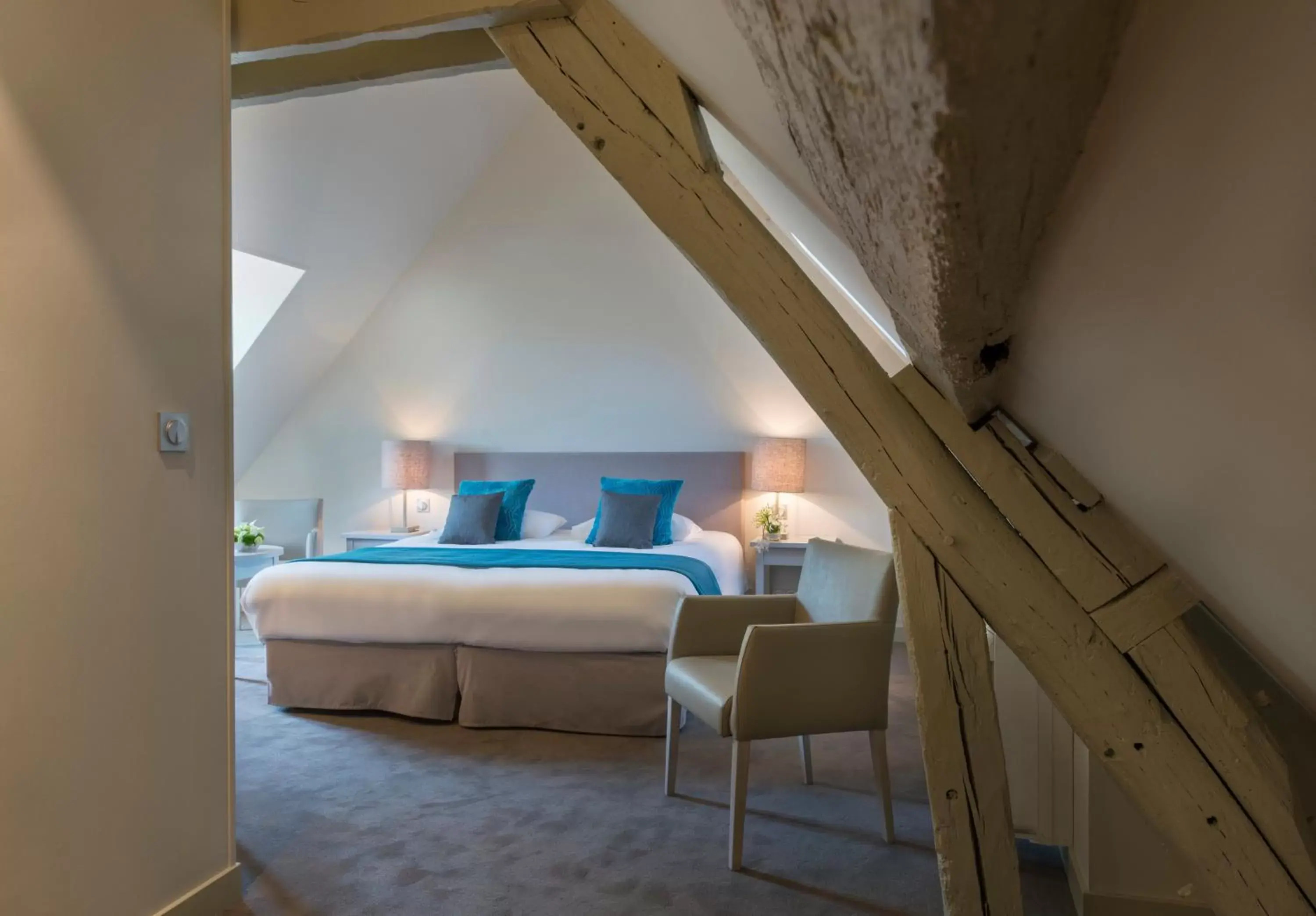Bedroom, Bed in Hôtel Aux Vieux Remparts, The Originals Relais