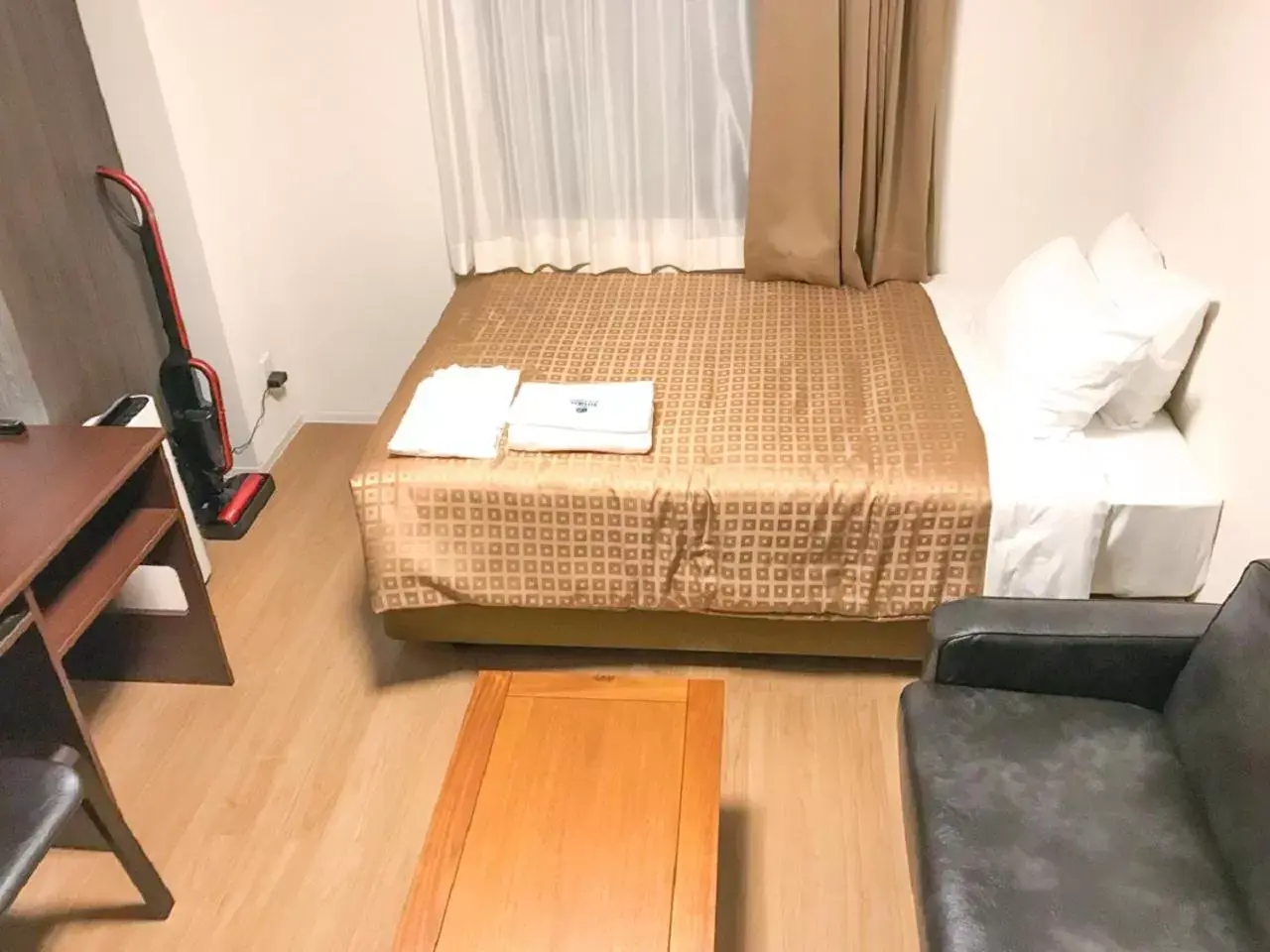 Bed in HOTEL LiVEMAX Takamatsu Eki Mae