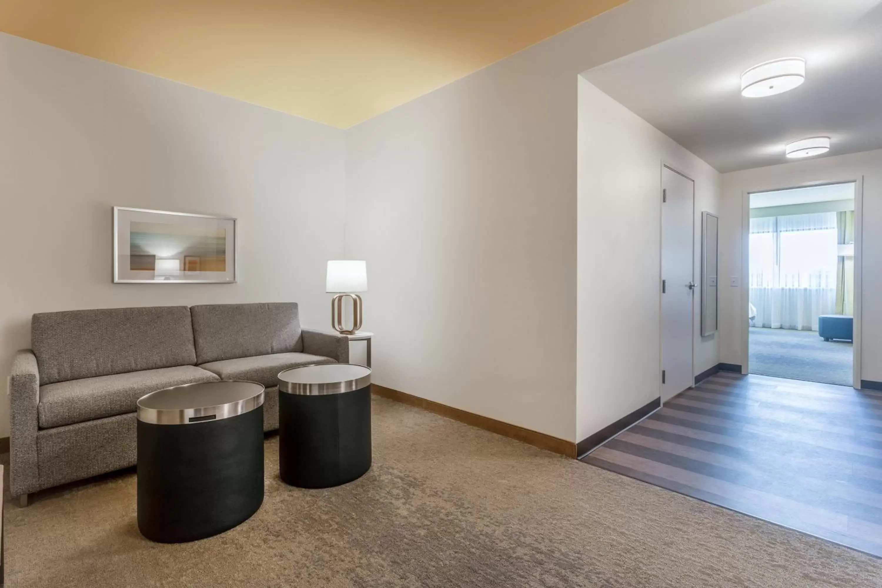 Bedroom, Seating Area in Holiday Inn & Suites Cedar Falls-Waterloo Event Ctr, an IHG Hotel