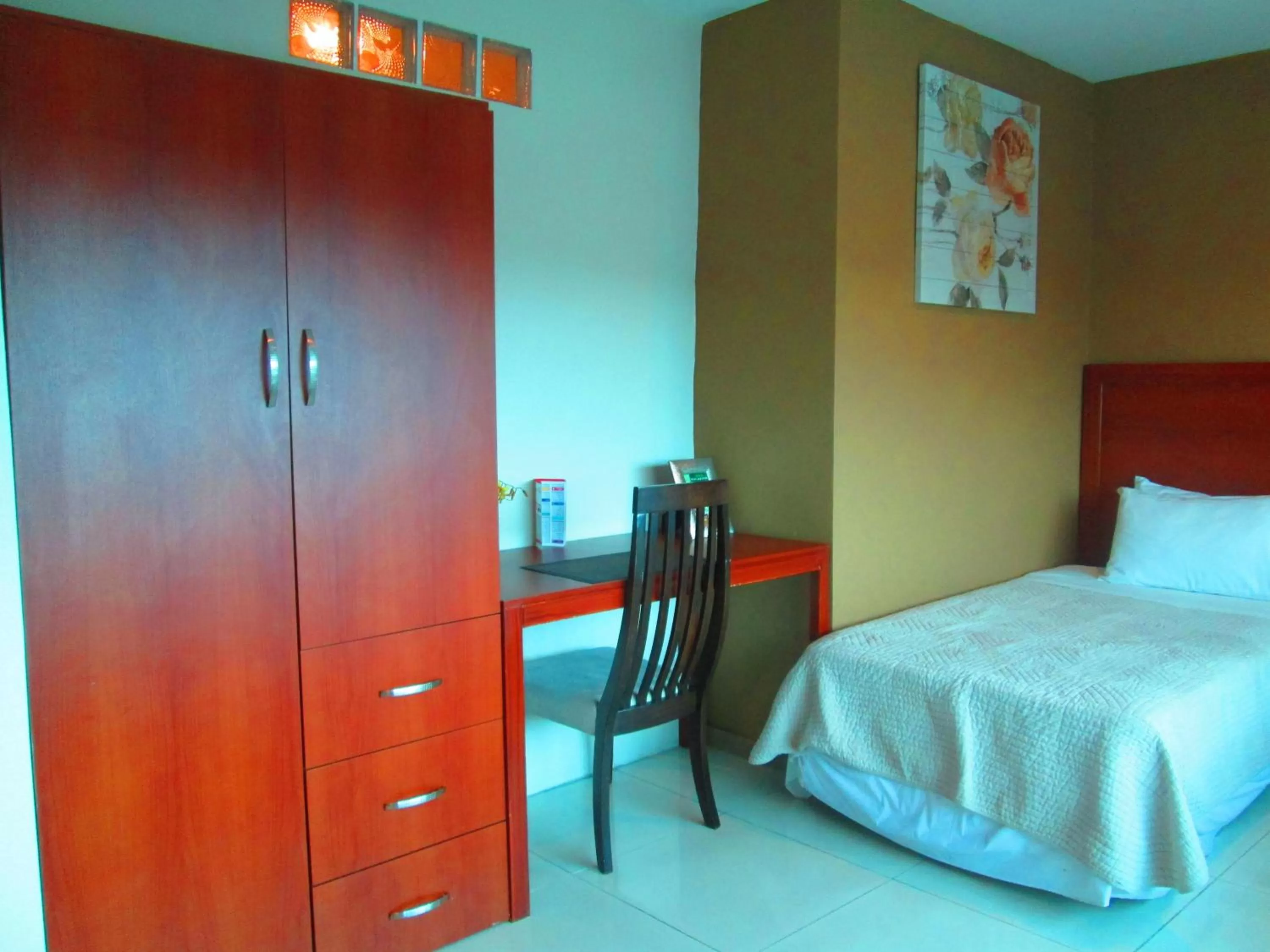 Bed in Hotel Garzota Inn