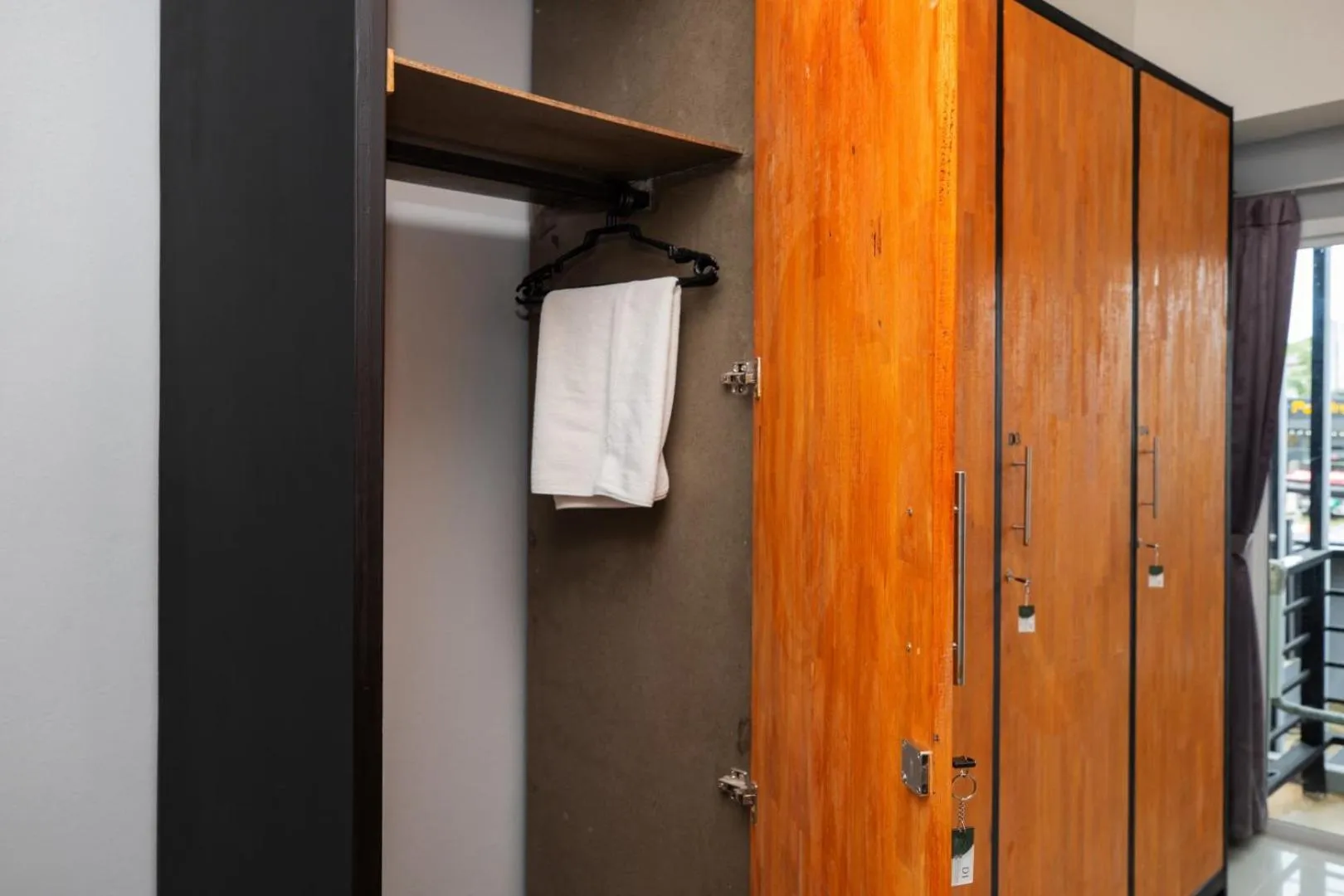 wardrobe, Bathroom in Bell Lifestyle Hostel Phuket