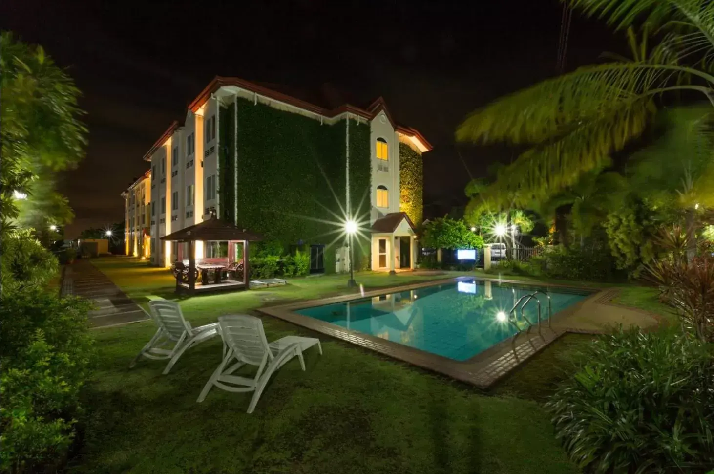 Swimming pool, Property Building in Microtel by Wyndham Batangas