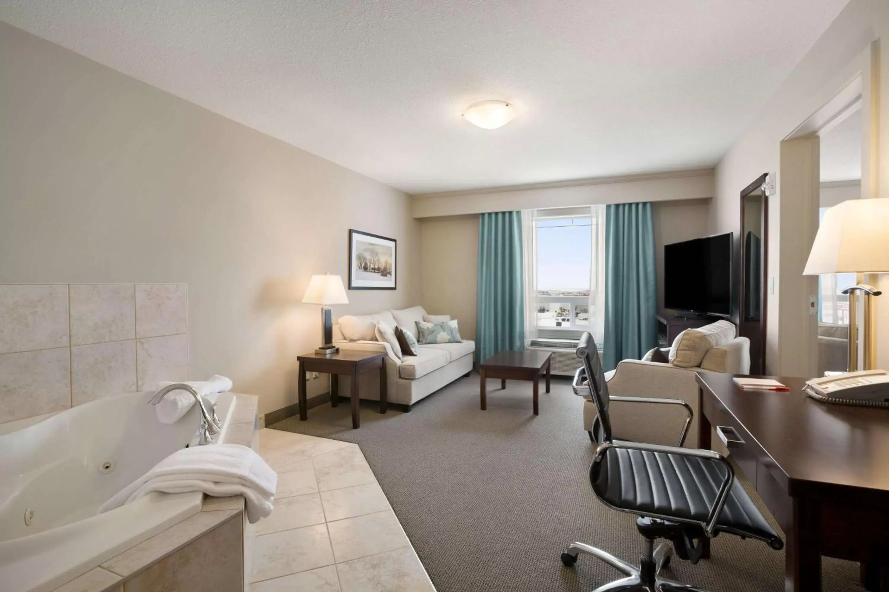 Photo of the whole room in Ramada by Wyndham Emerald Park/Regina East