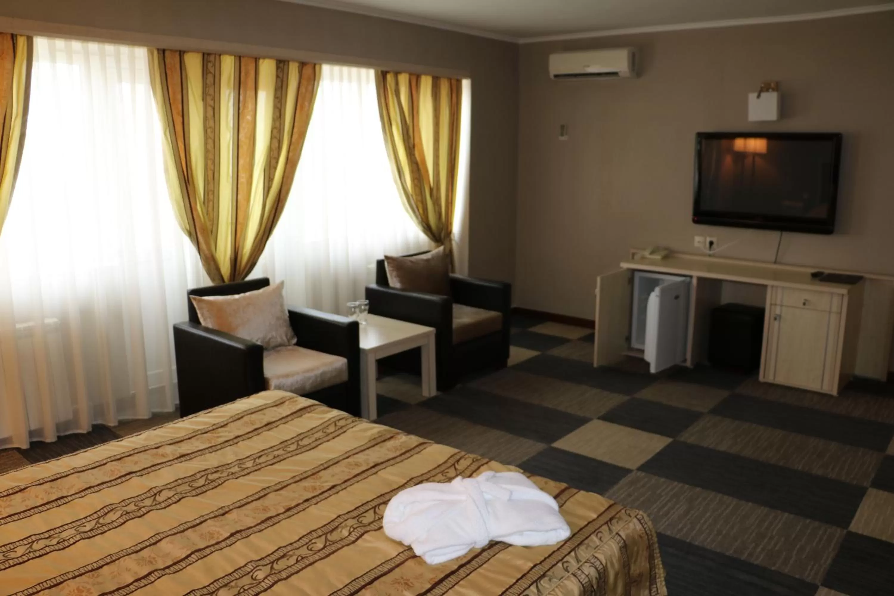 TV and multimedia, Bed in Aktau Hotel