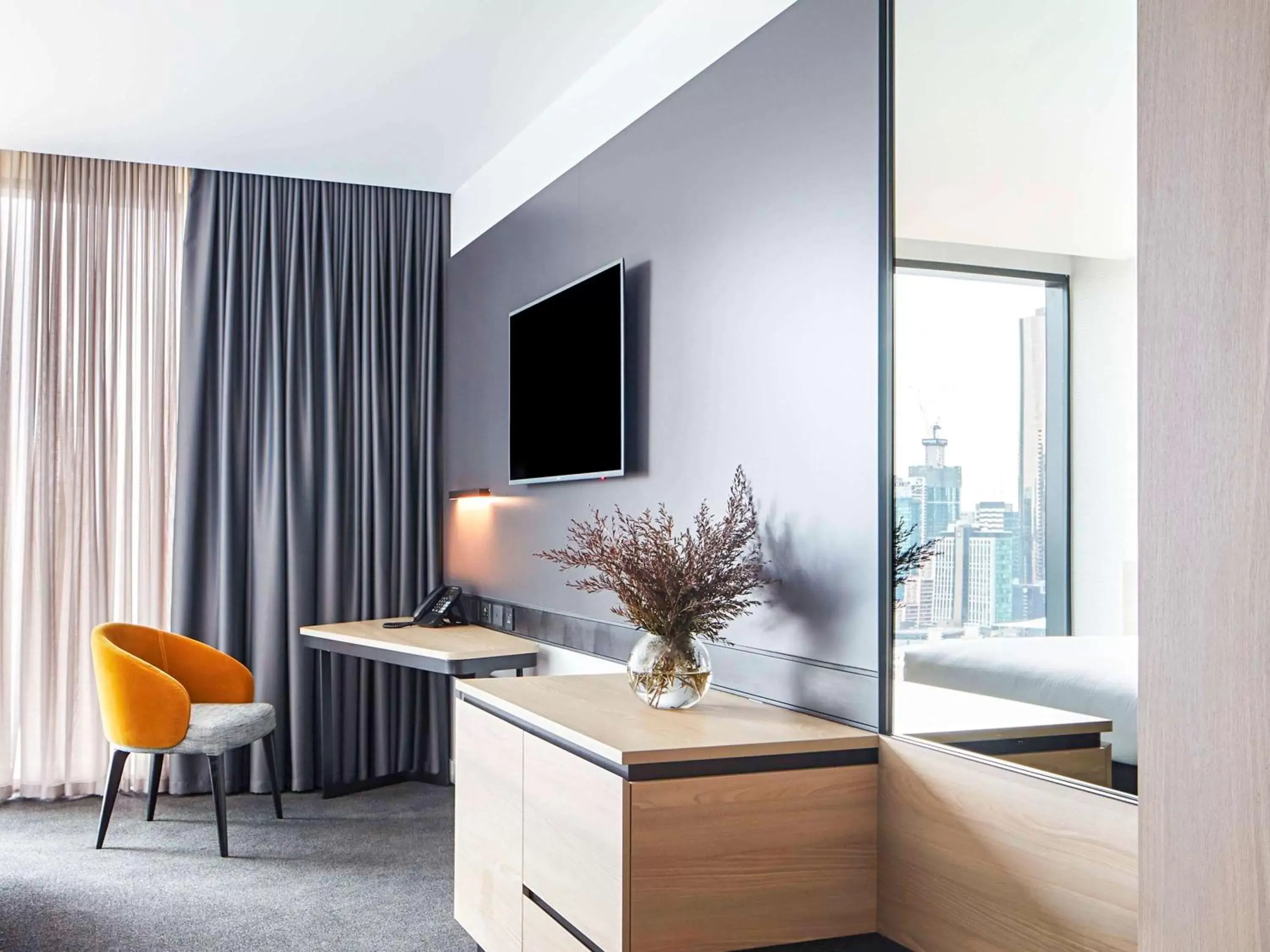 Photo of the whole room, TV/Entertainment Center in Novotel Melbourne South Wharf