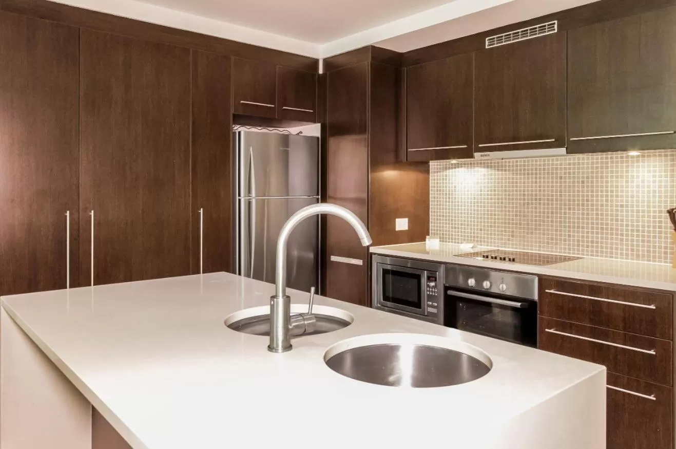 Kitchen/Kitchenette in Port Douglas Private Apartments in Temple