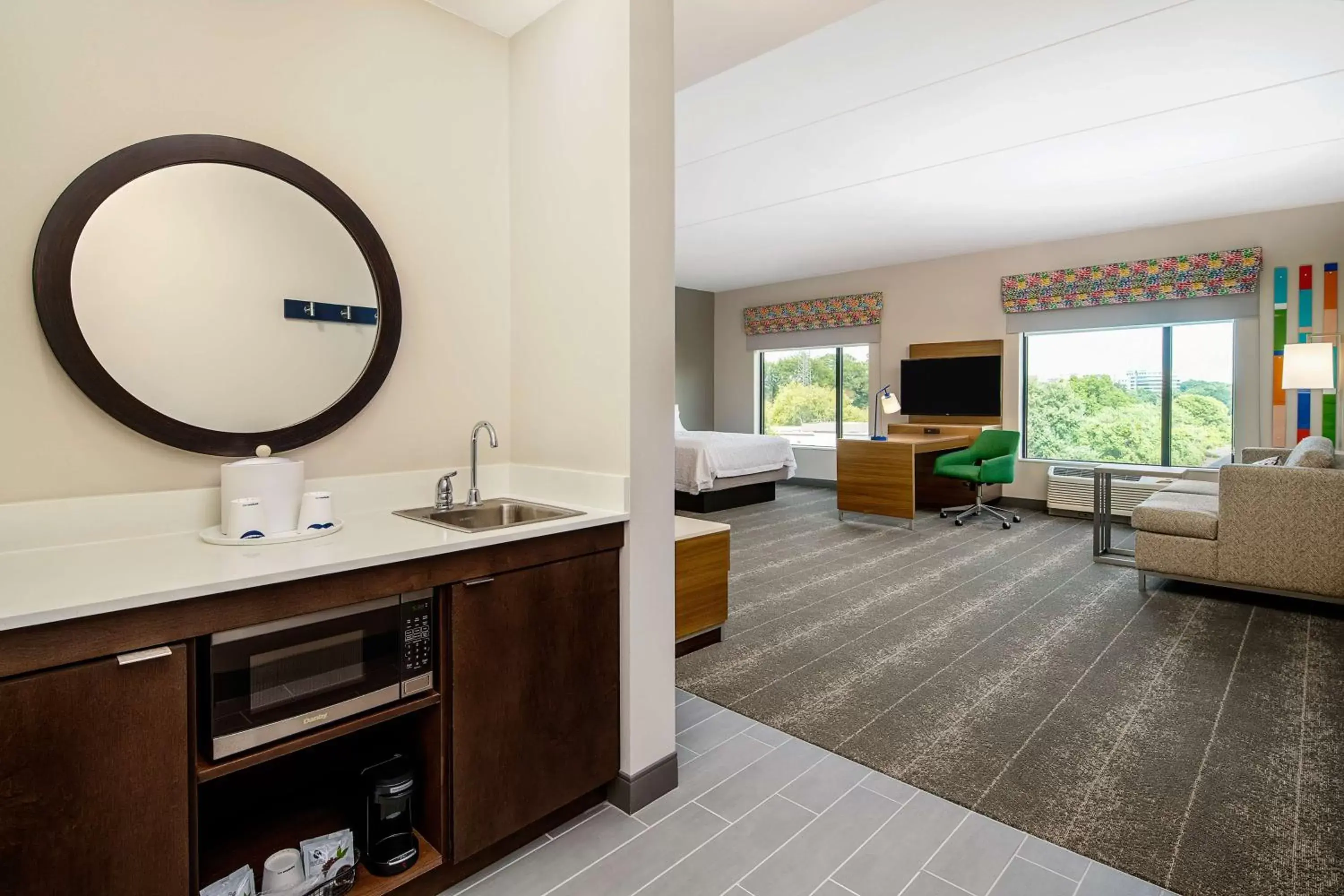 Living room, Bathroom in Hampton Inn & Suites Raleigh Midtown, NC