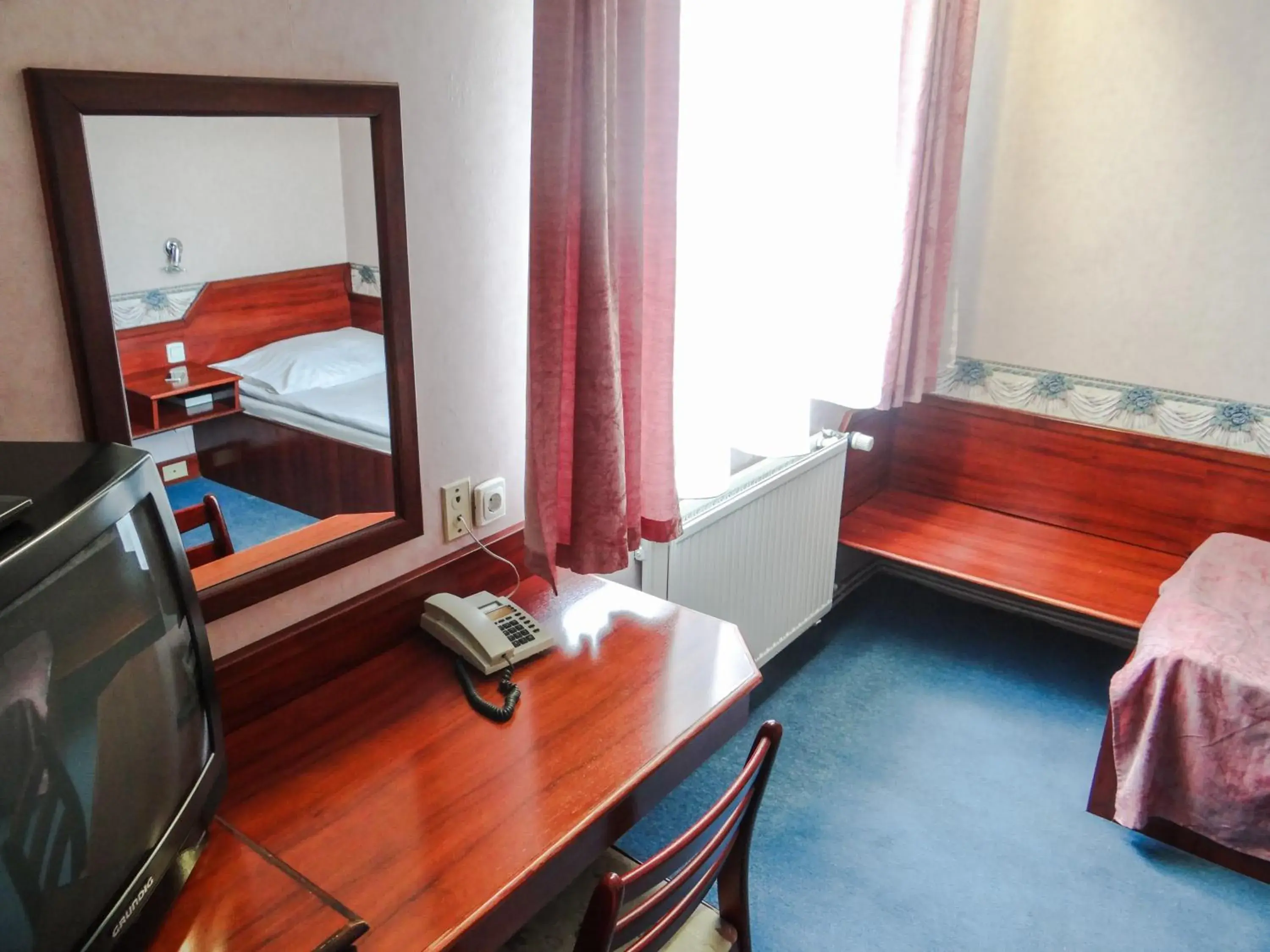 Seating area, Bed in Classic Hotel Seating area, Bed in Classic Hotel