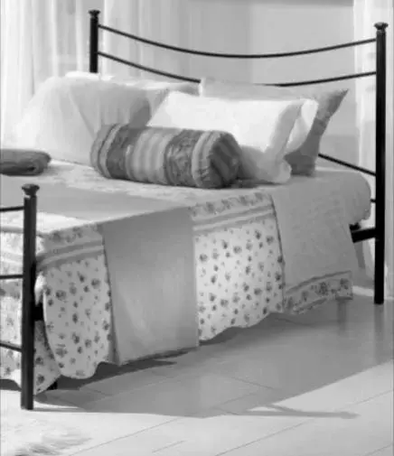Bed in Alessi Suites & Studio