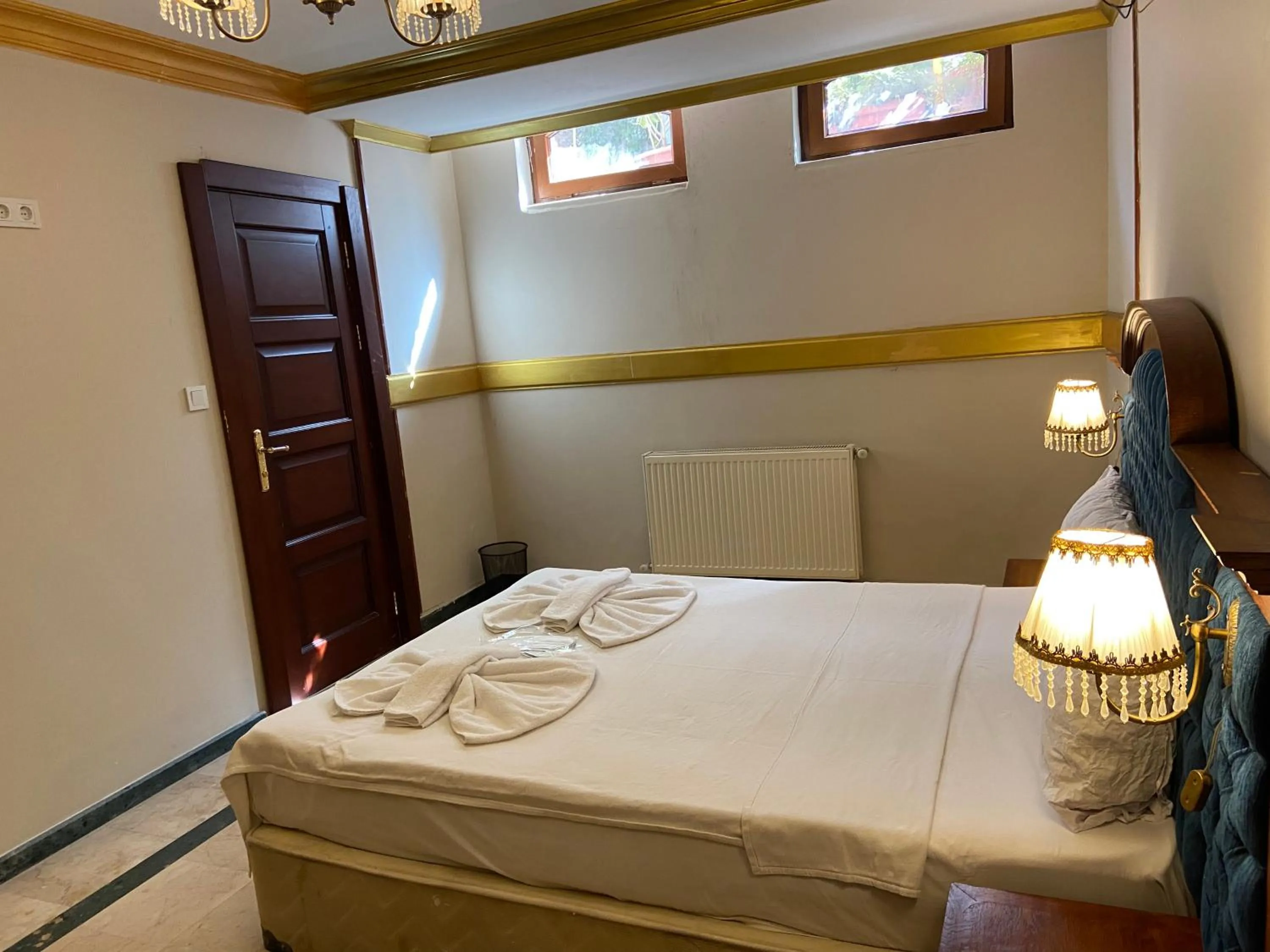 Bed in Aruna Boutique Hotel