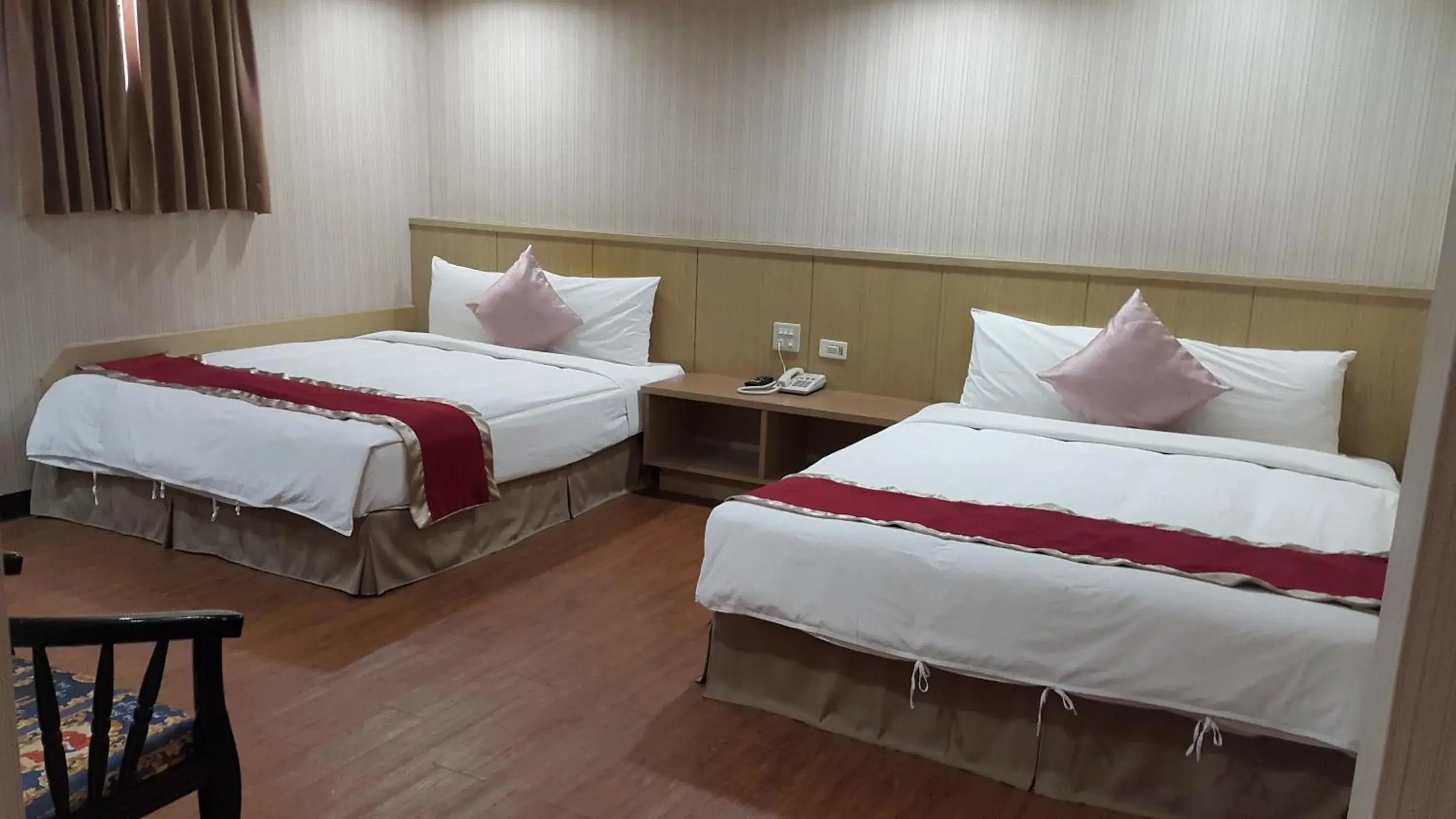 Bed in Mei-Hua Hotel