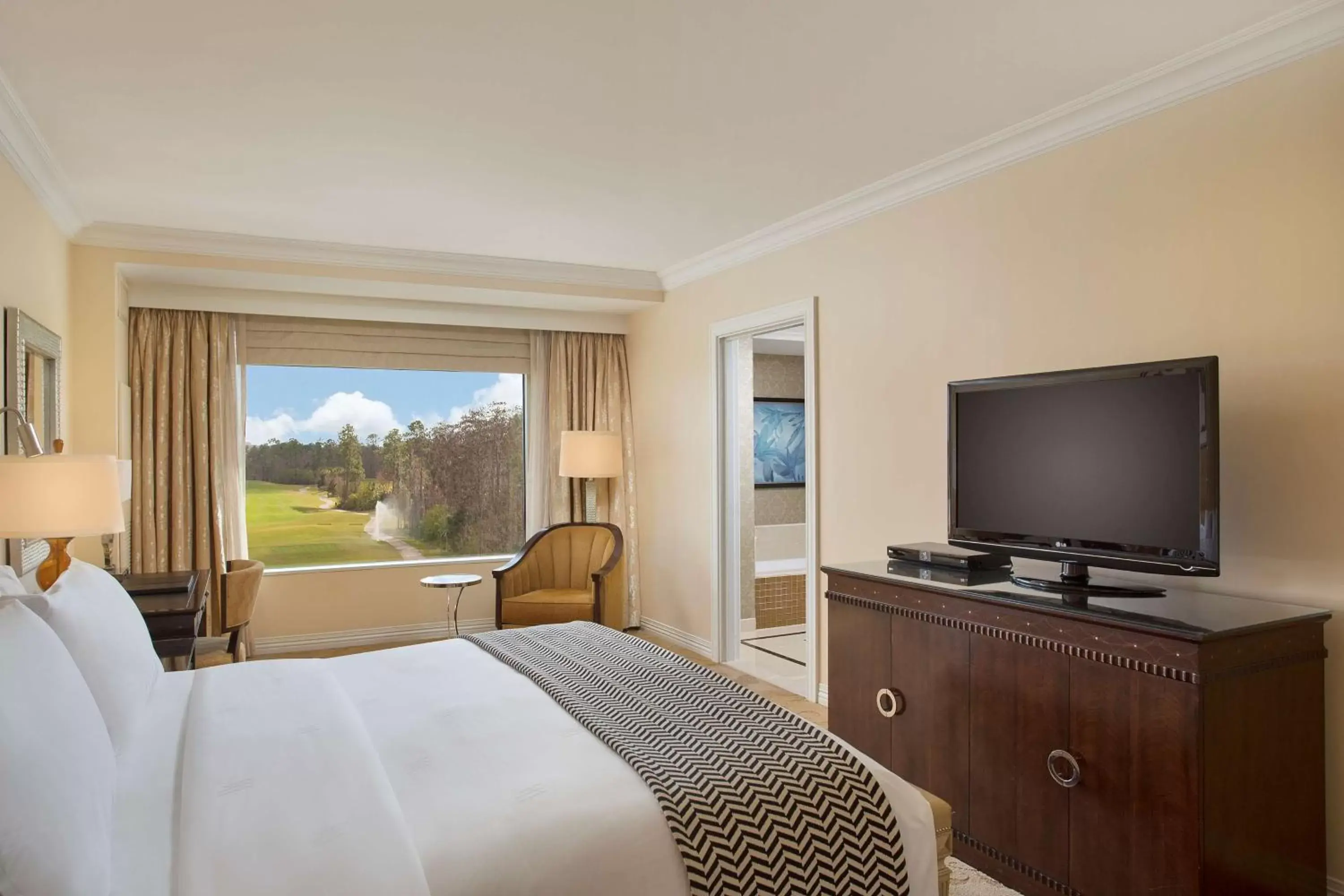 Bedroom, TV/Entertainment Center in Waldorf Astoria Orlando