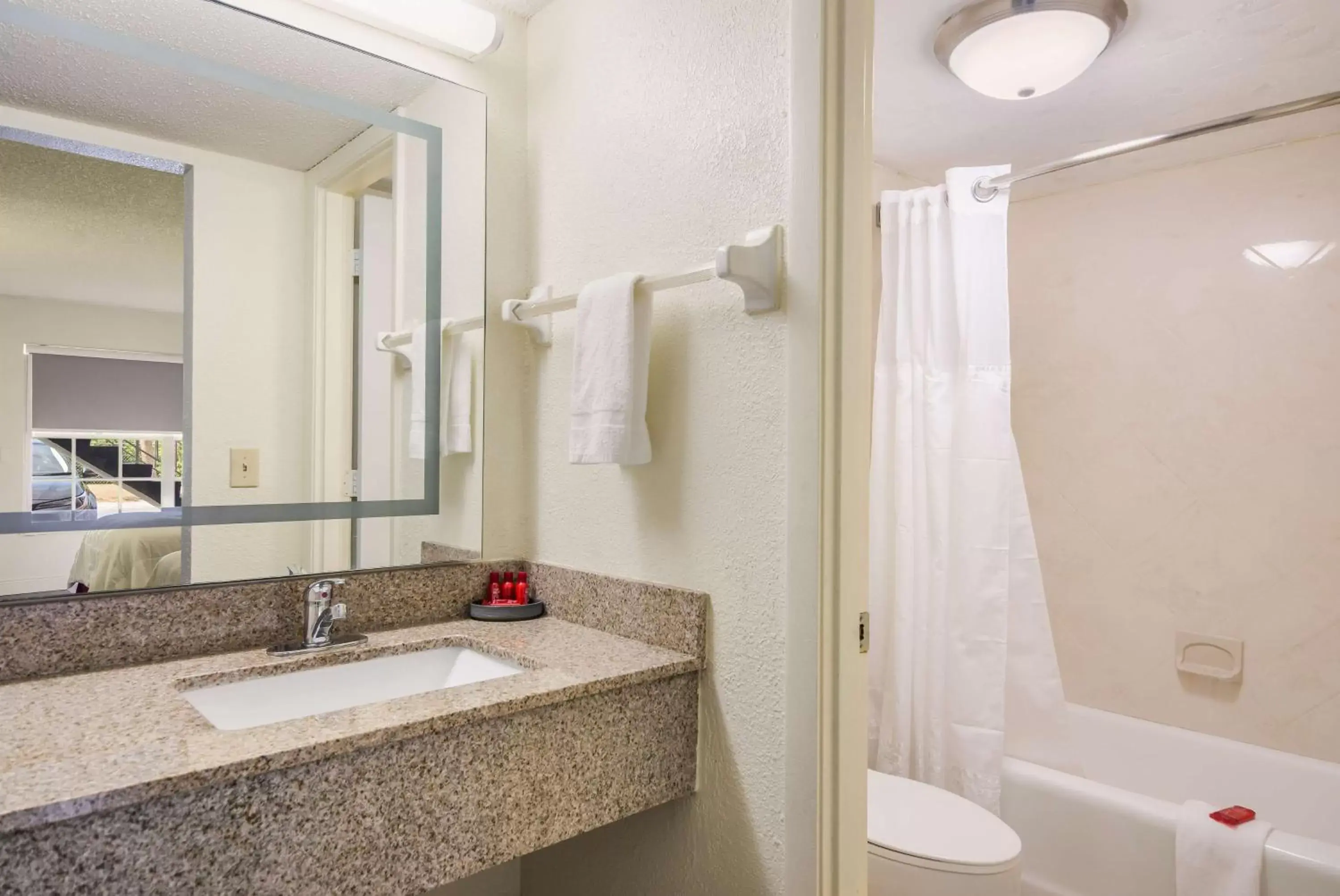 Photo of the whole room, Bathroom in SureStay Hotel by Best Western Sarasota Lido Beach