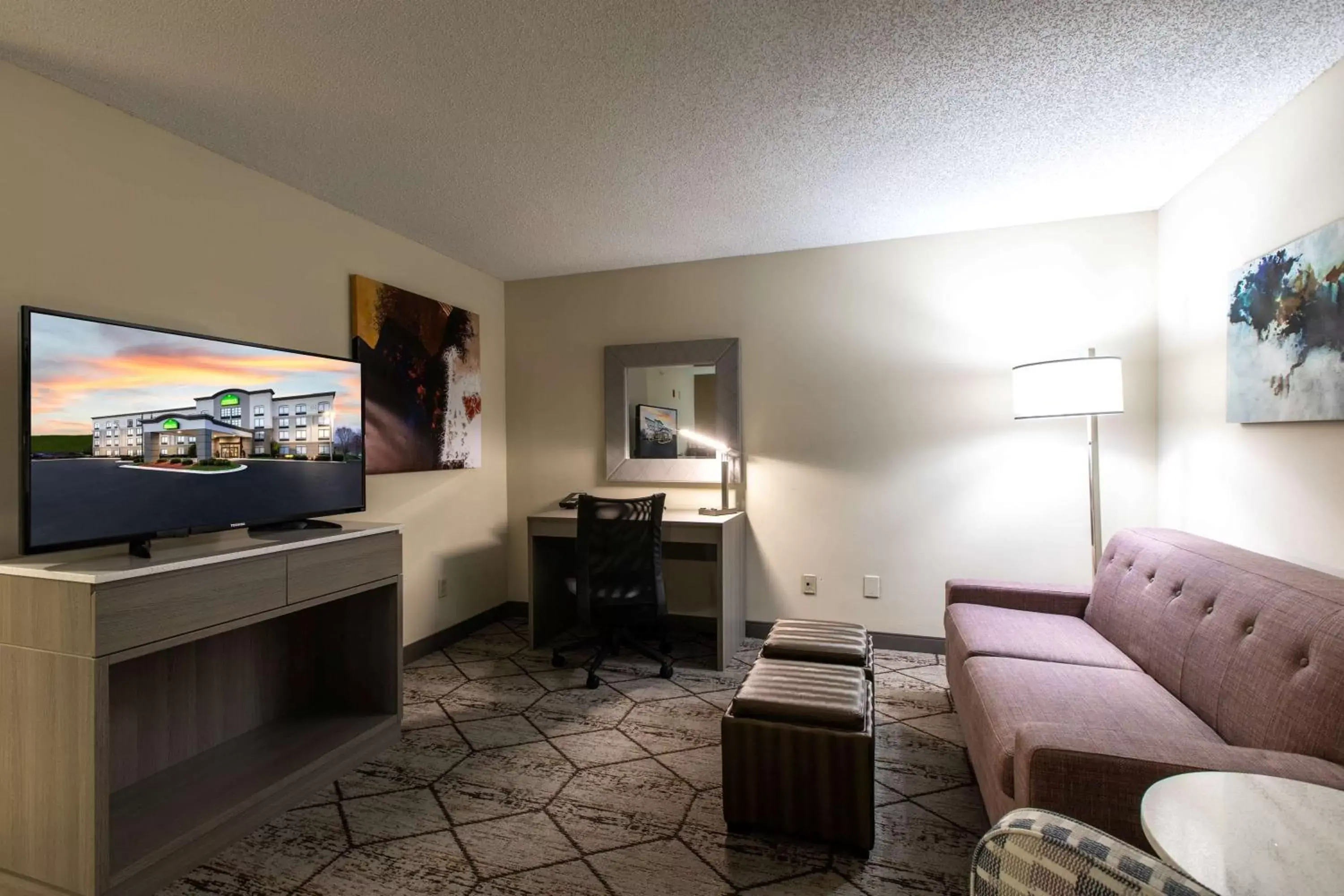 Photo of the whole room, TV/Entertainment Center in Wingate by Wyndham Charlotte Concord Mills/Speedway