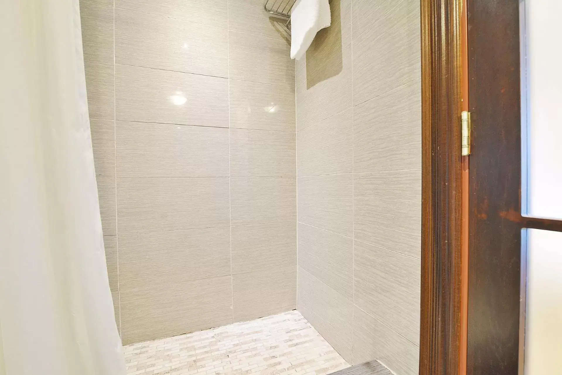 Bathroom in Woodbine Hotel & Suites Bathroom in Woodbine Hotel & Suites