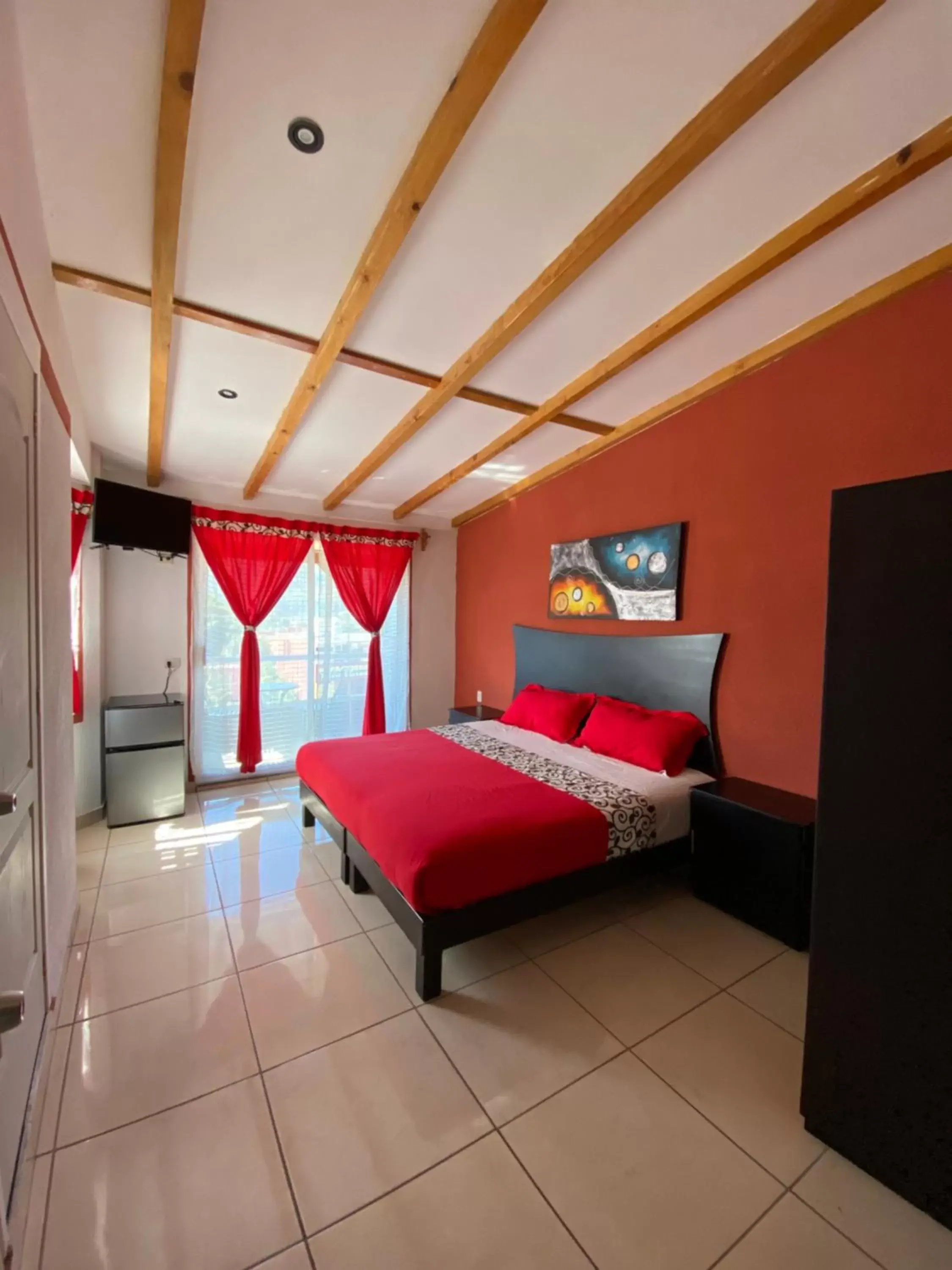 Photo of the whole room, Bed in Hotel & Suites Cerro Roj0