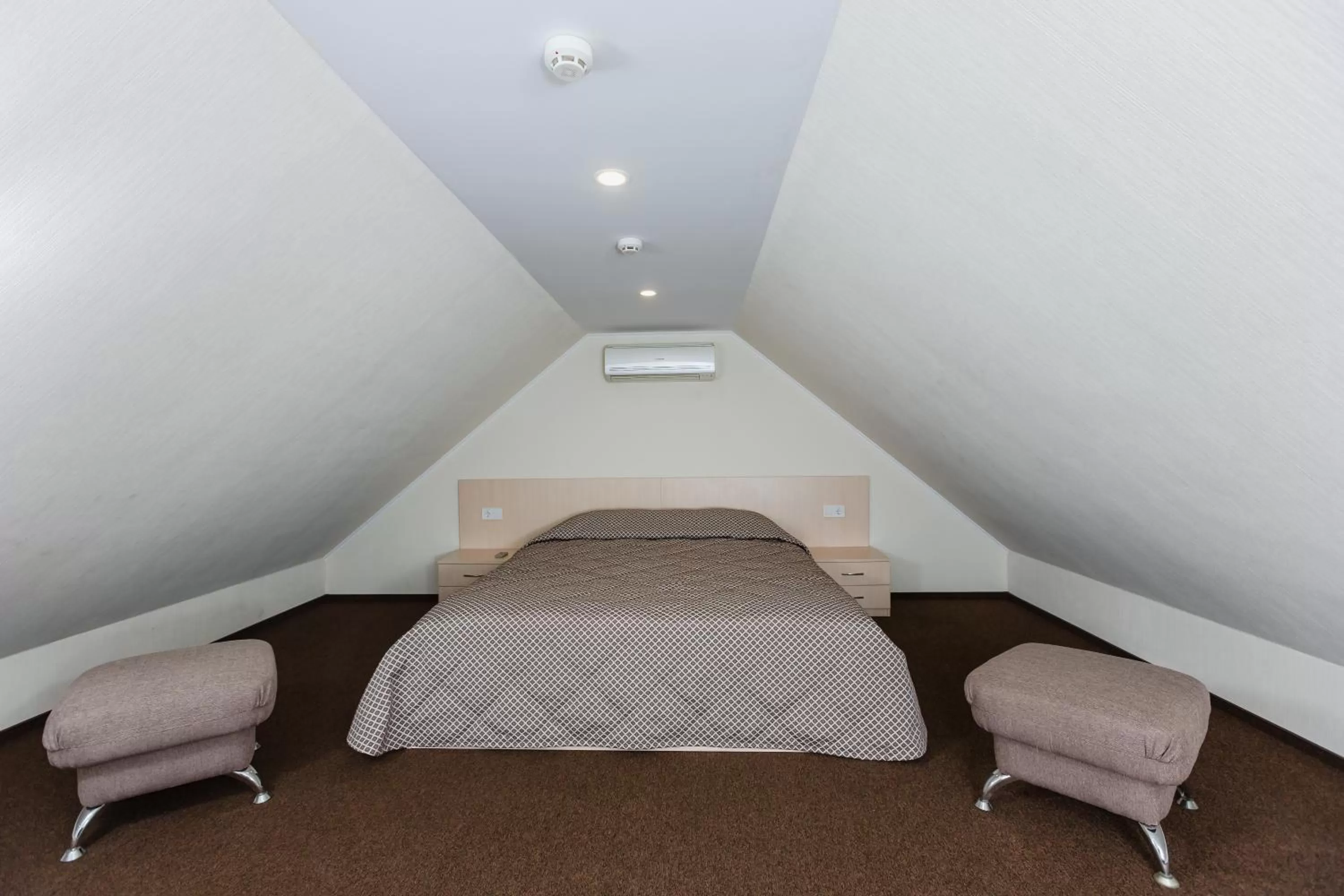 Bed in ONOVO Dendra Hotel