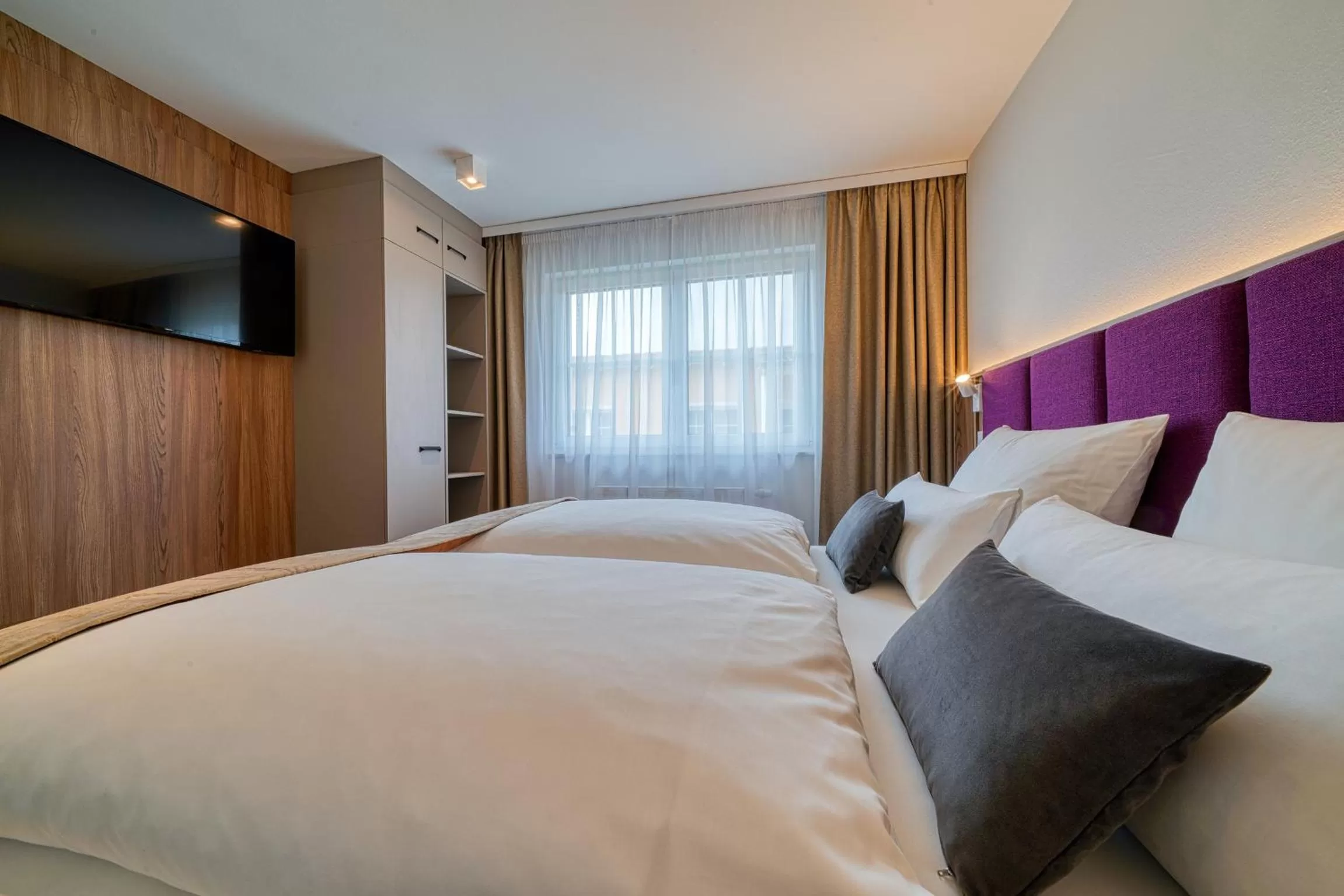 Bed in FourSide Hotel Ringsheim, Trademark Collection by Wyndham