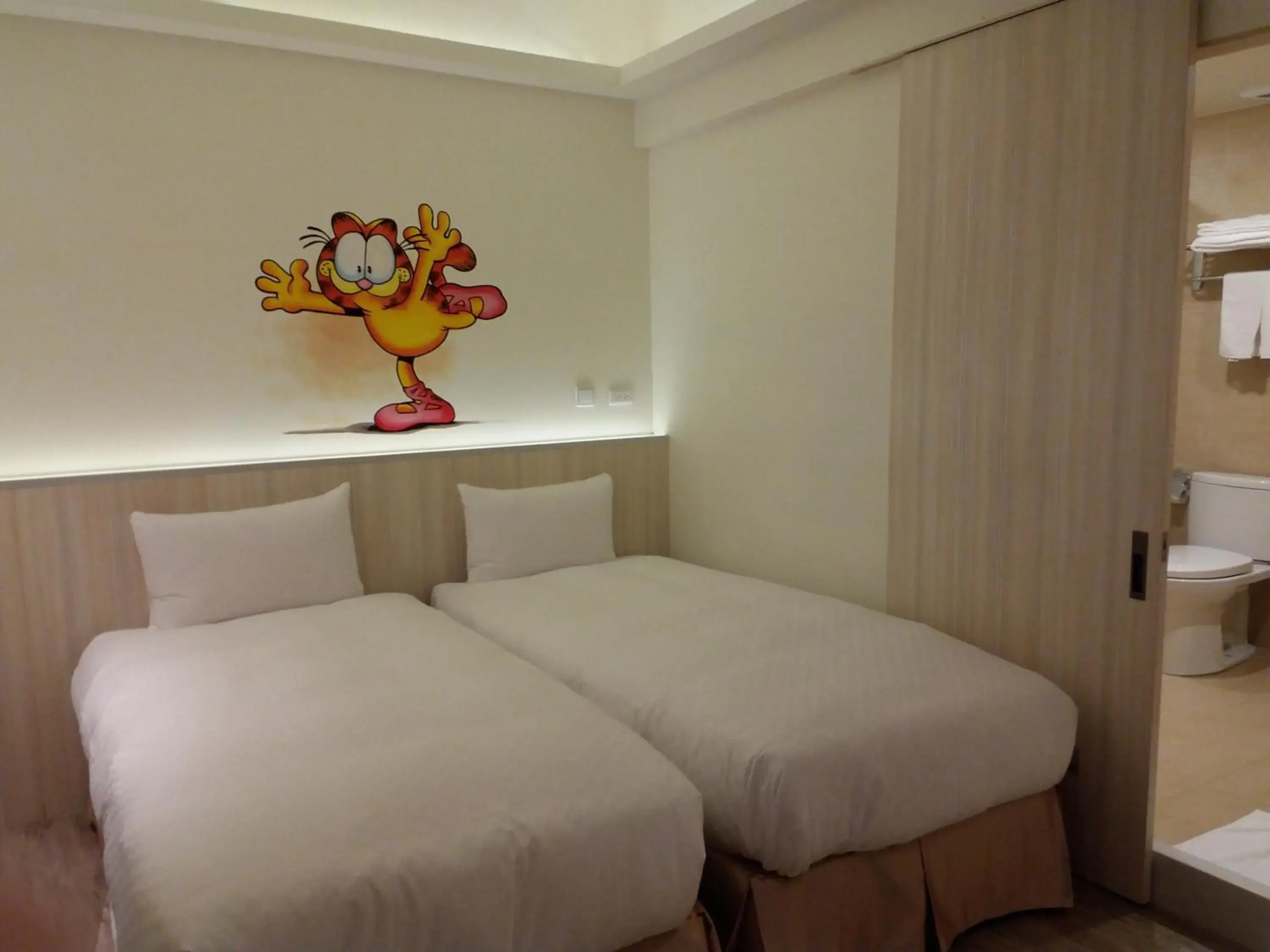 Photo of the whole room, Bed in M Hotel