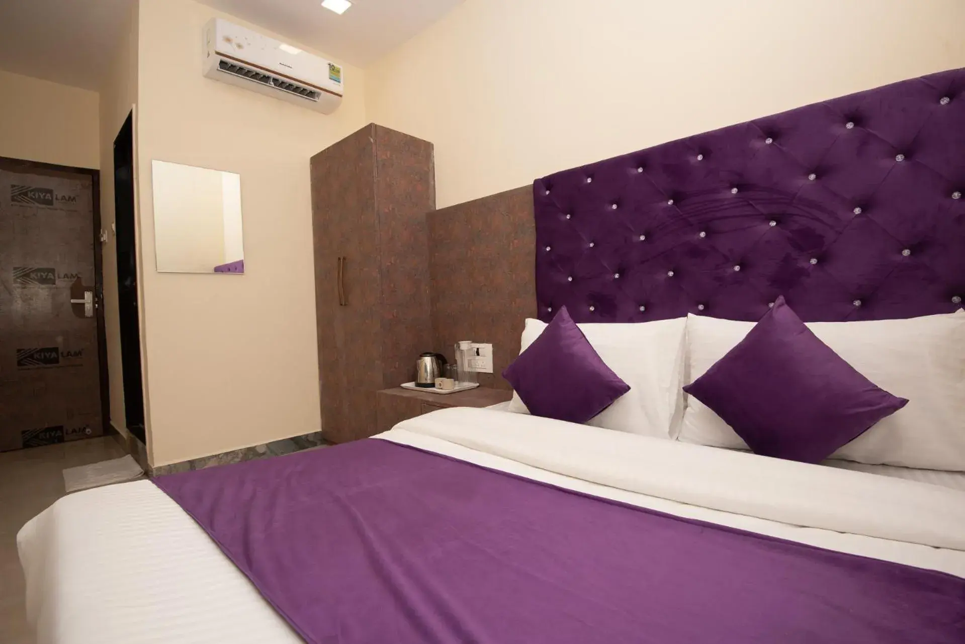 Bed in Hotel Priceless Suite-Nesco Exhibition Goregaon