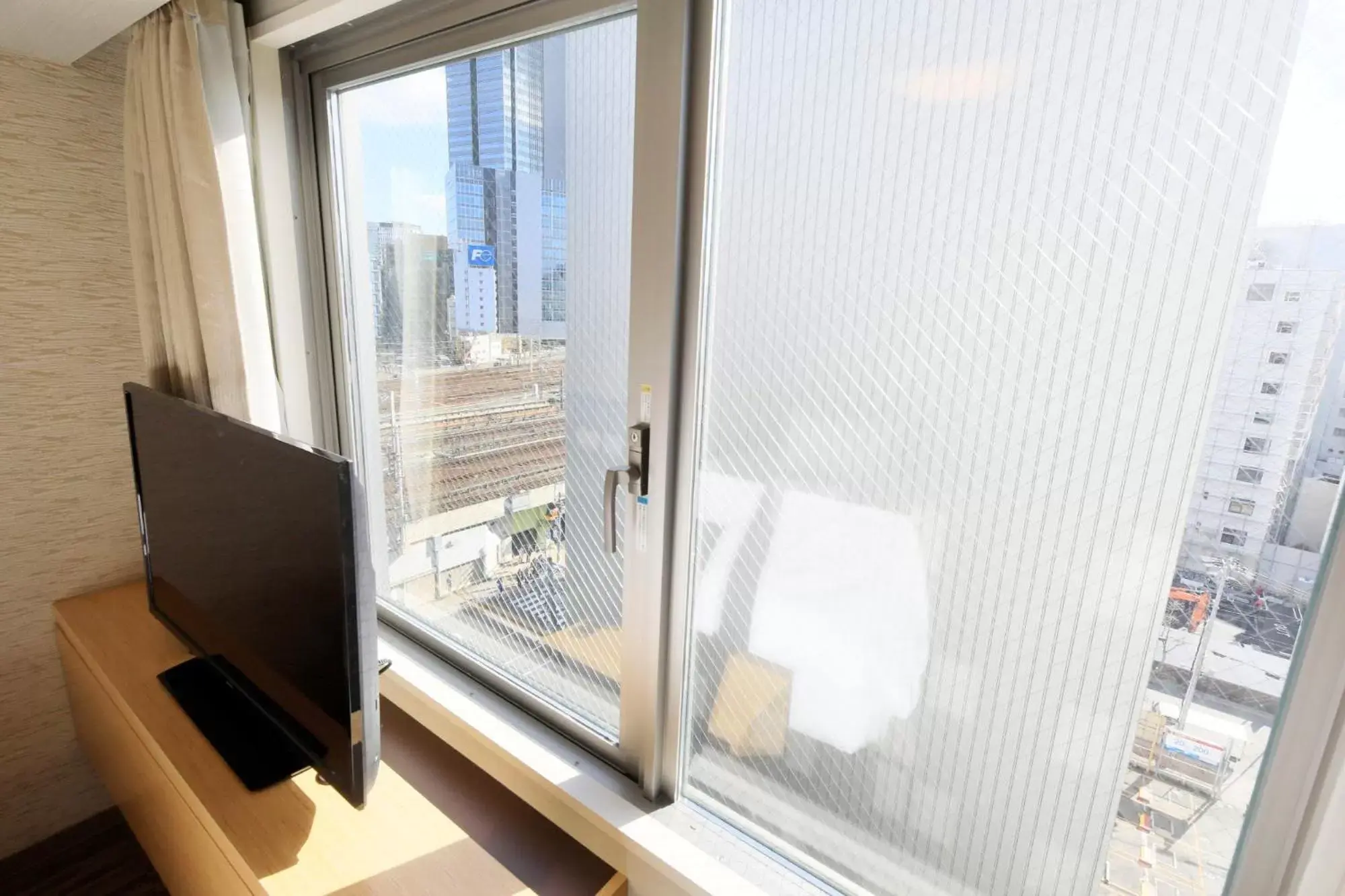 View (from property/room), TV/Entertainment Center in Richmond Hotel Nagoya Shinkansen-guchi