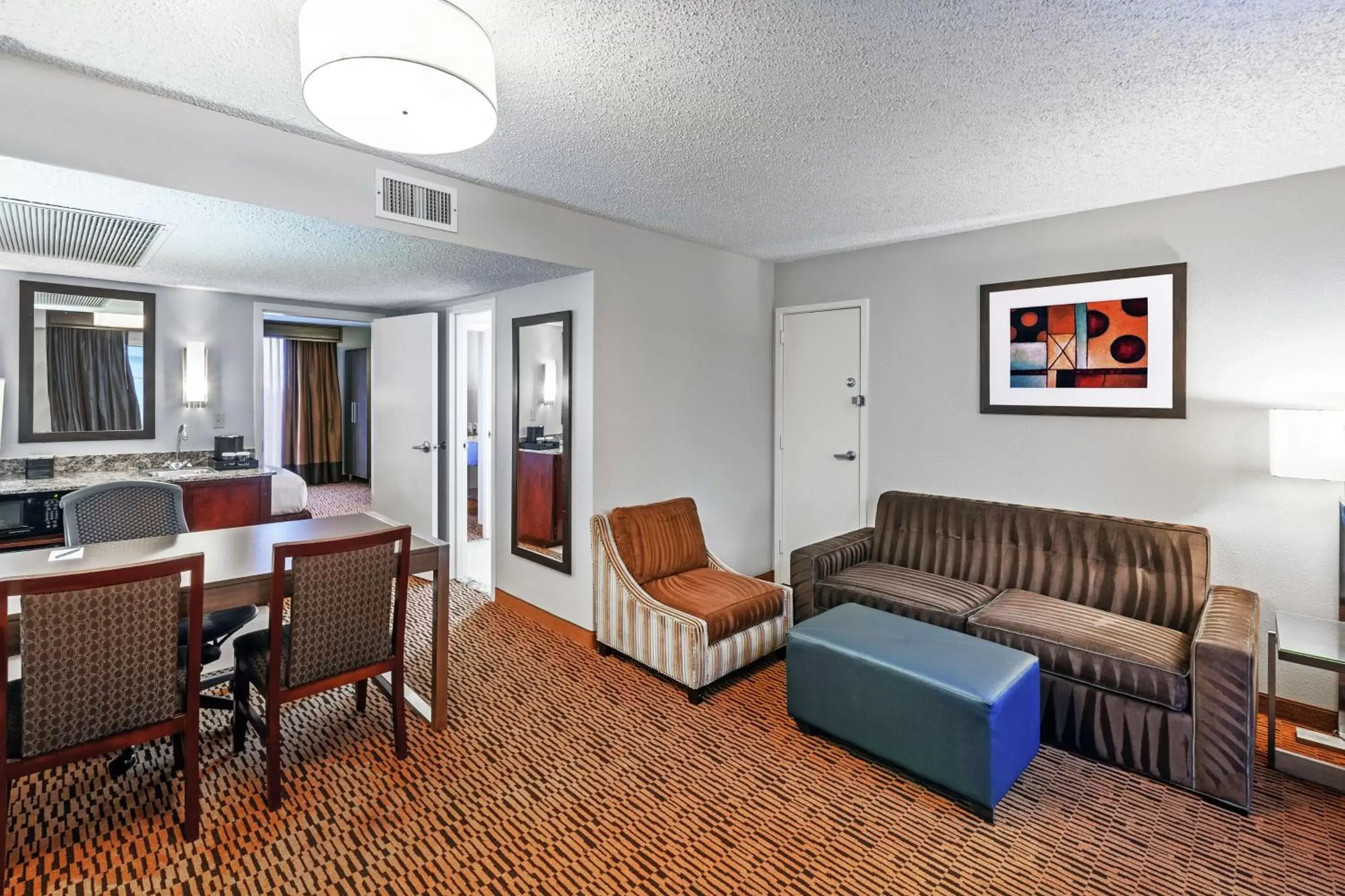 Living room, Seating Area in Embassy Suites by Hilton Dallas Market Center