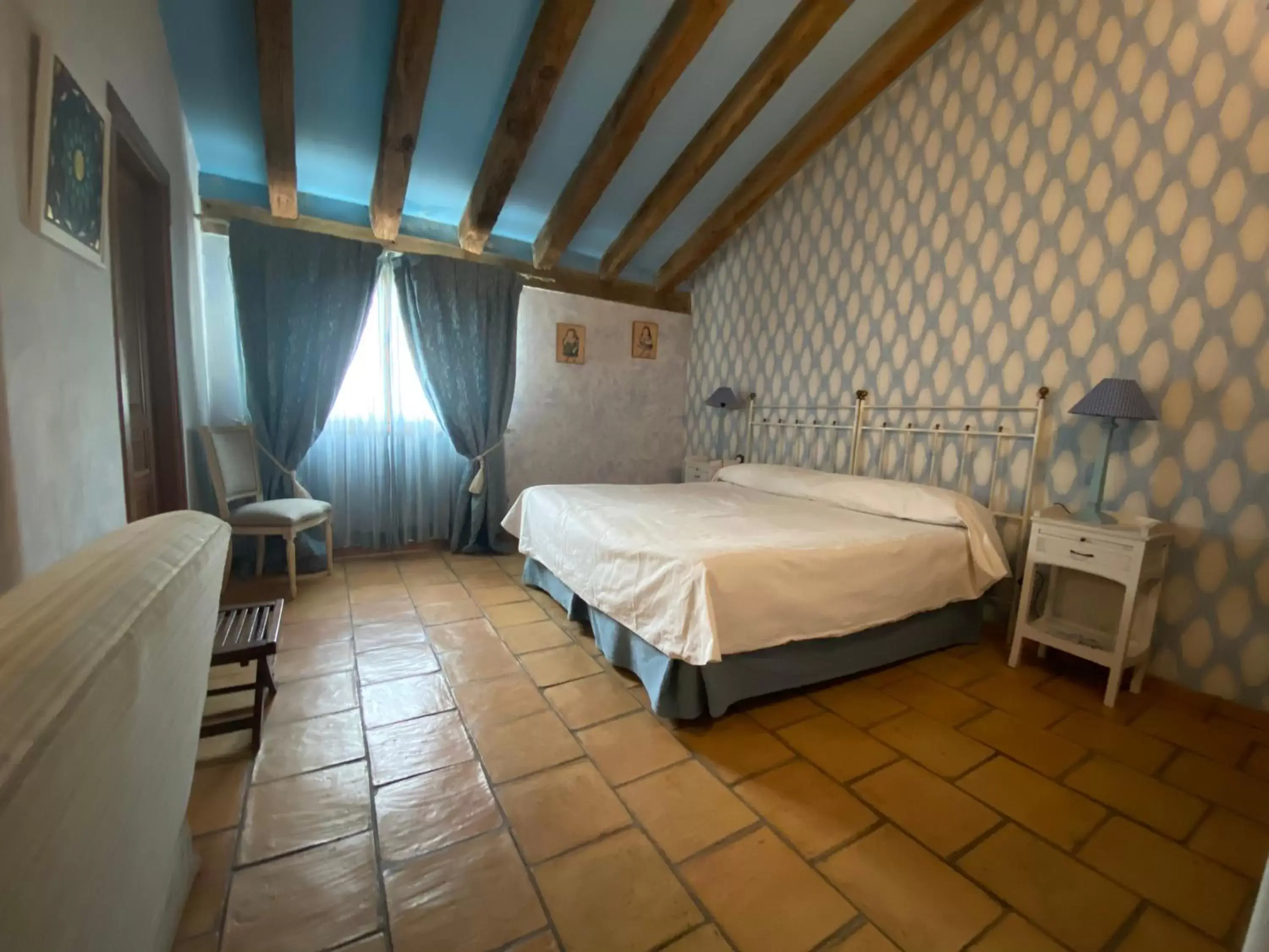 Photo of the whole room, Bed in Posada Restaurante Fuenteplateada
