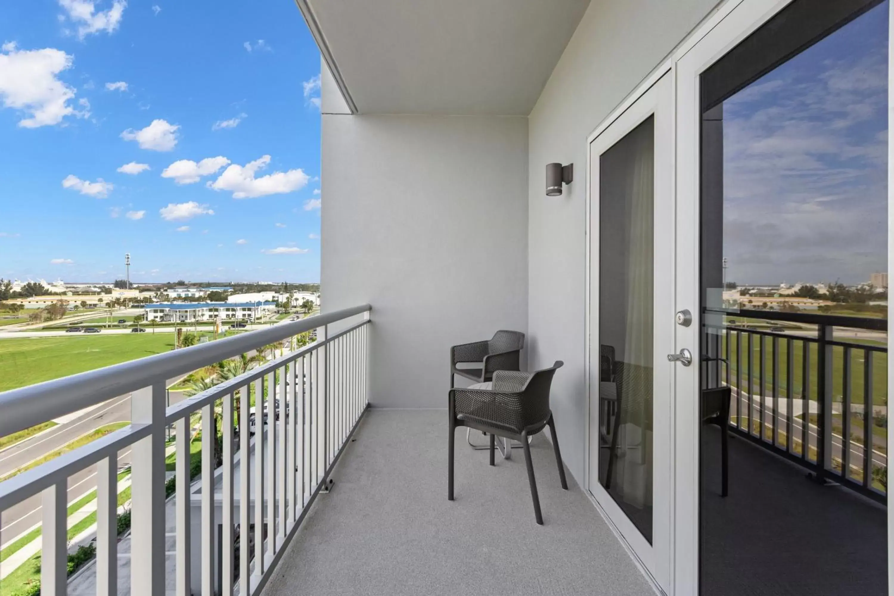 Bedroom, Balcony/Terrace in TownePlace Suites by Marriott Cape Canaveral Cocoa Beach