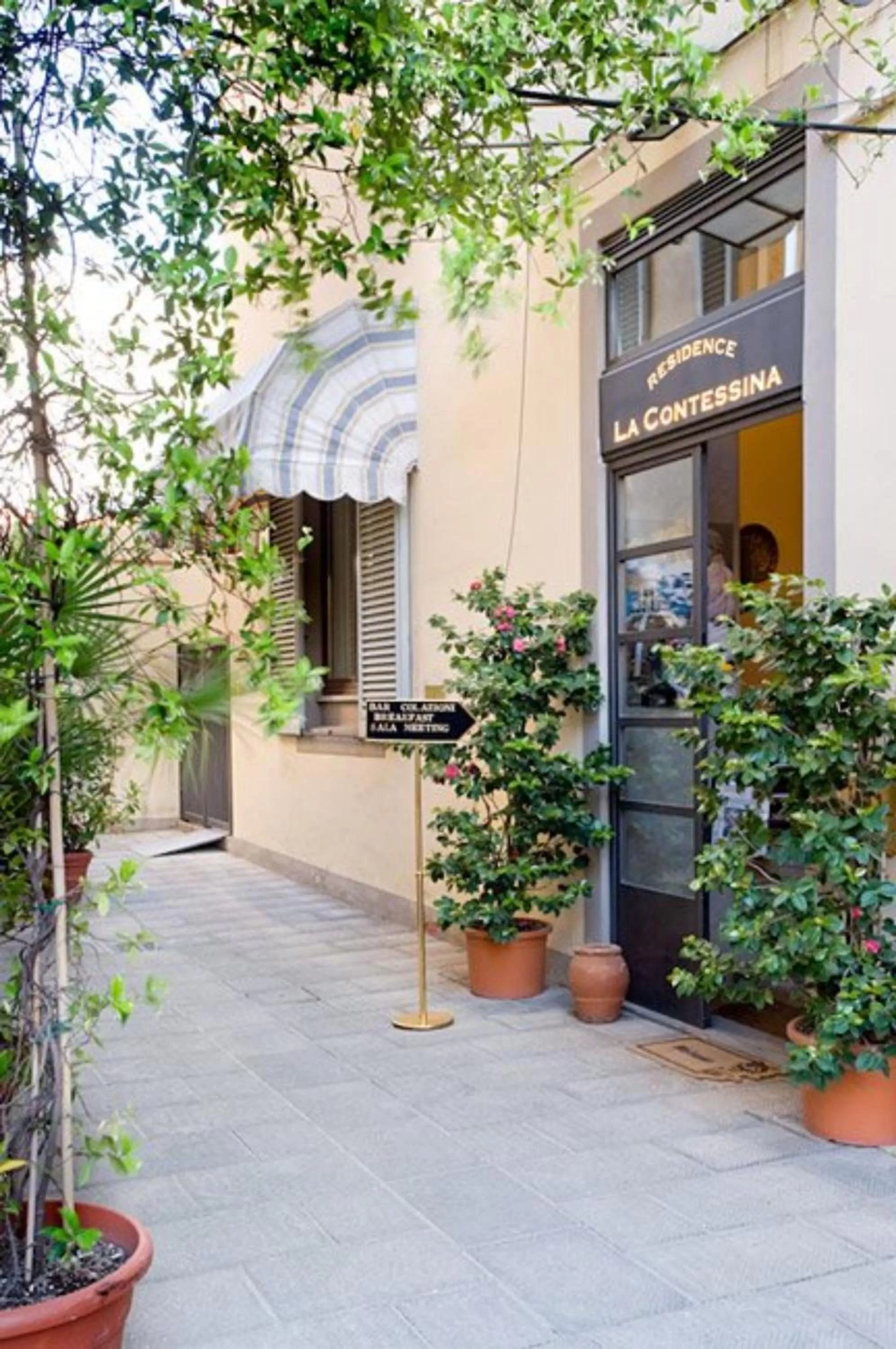 Property logo or sign in Hotel Residence La Contessina