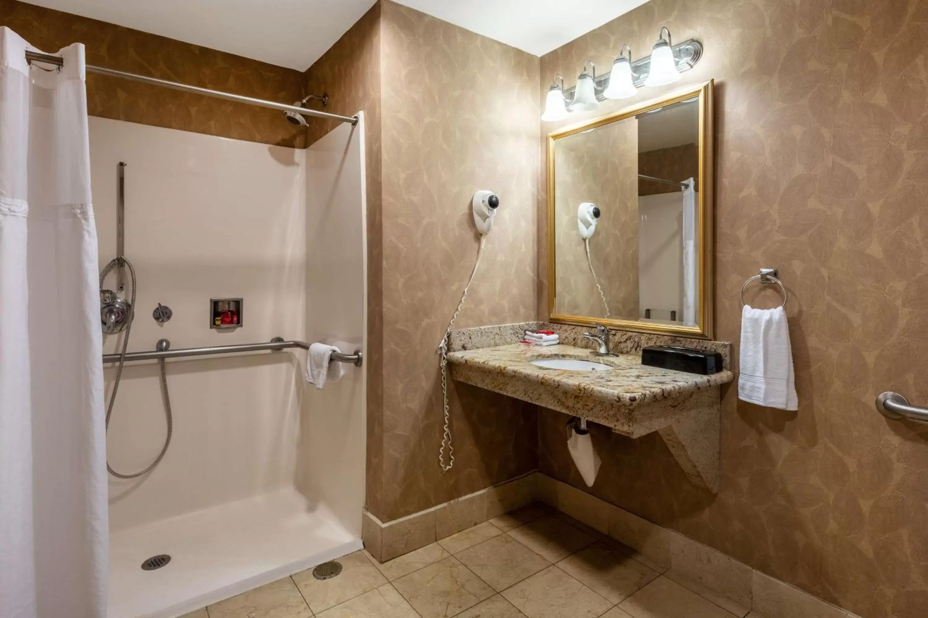 Bathroom in SureStay Plus Hotel by Best Western Mountain View Bathroom in SureStay Plus Hotel by Best Western Mountain View