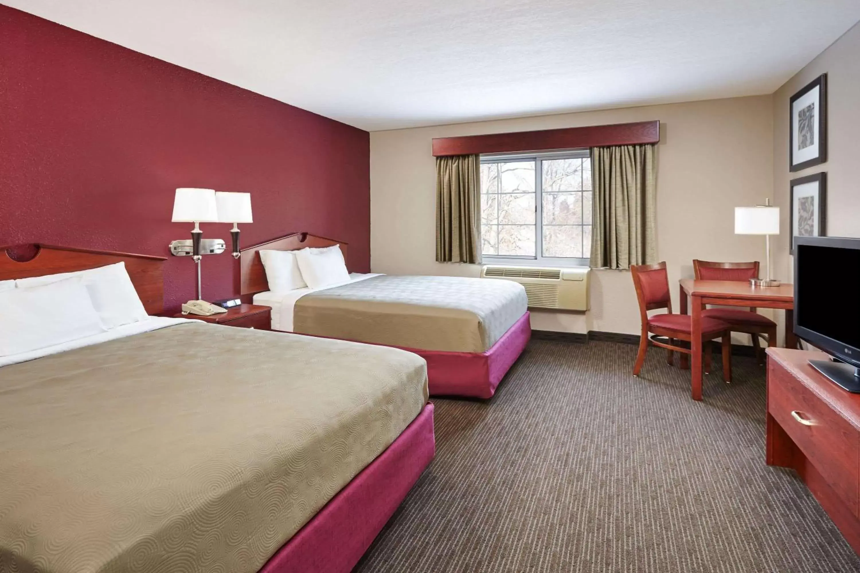 Photo of the whole room in AmericInn by Wyndham Douglas/Saugatuck