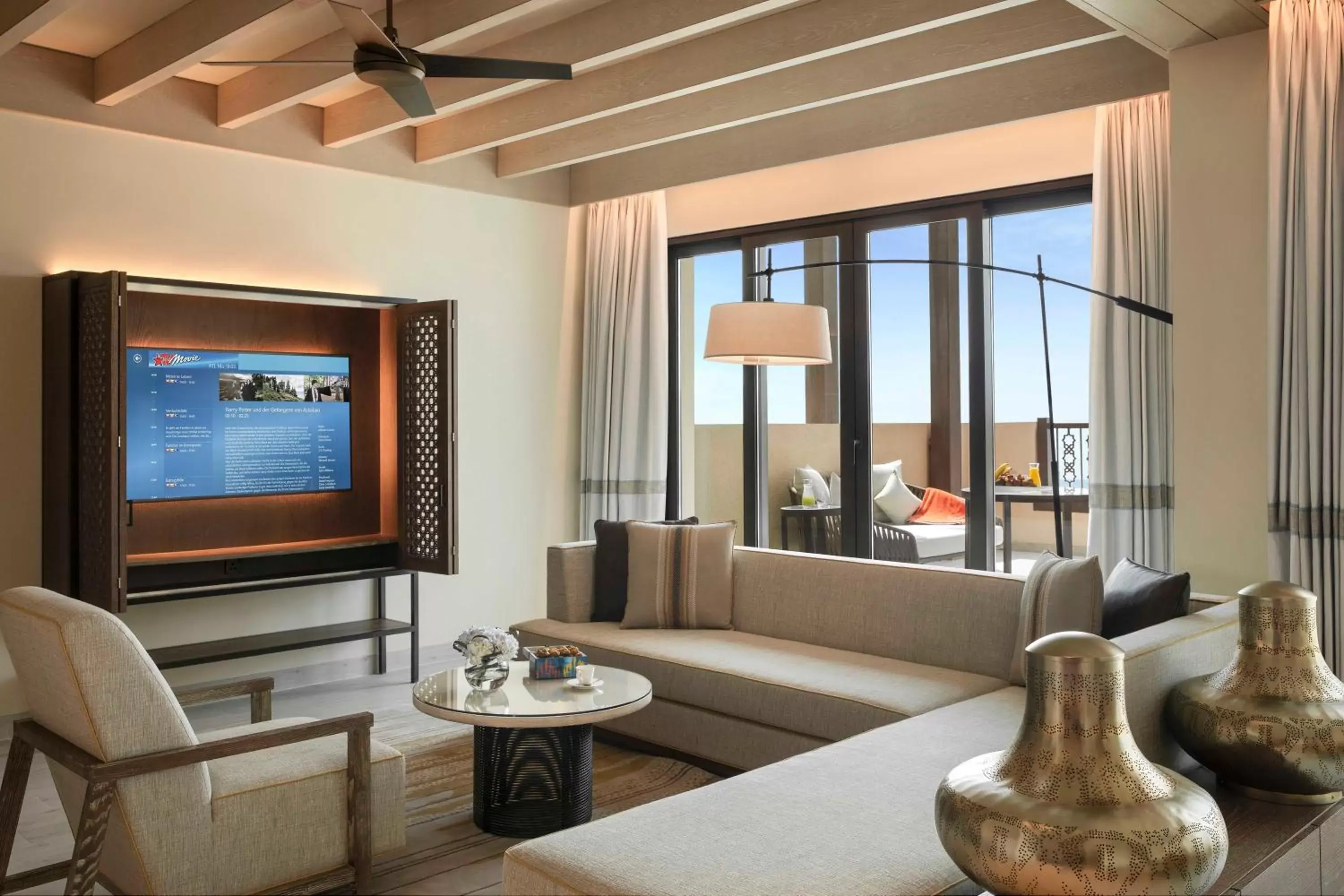 Living room, TV/Entertainment Center in Saadiyat Rotana Resort and Villas