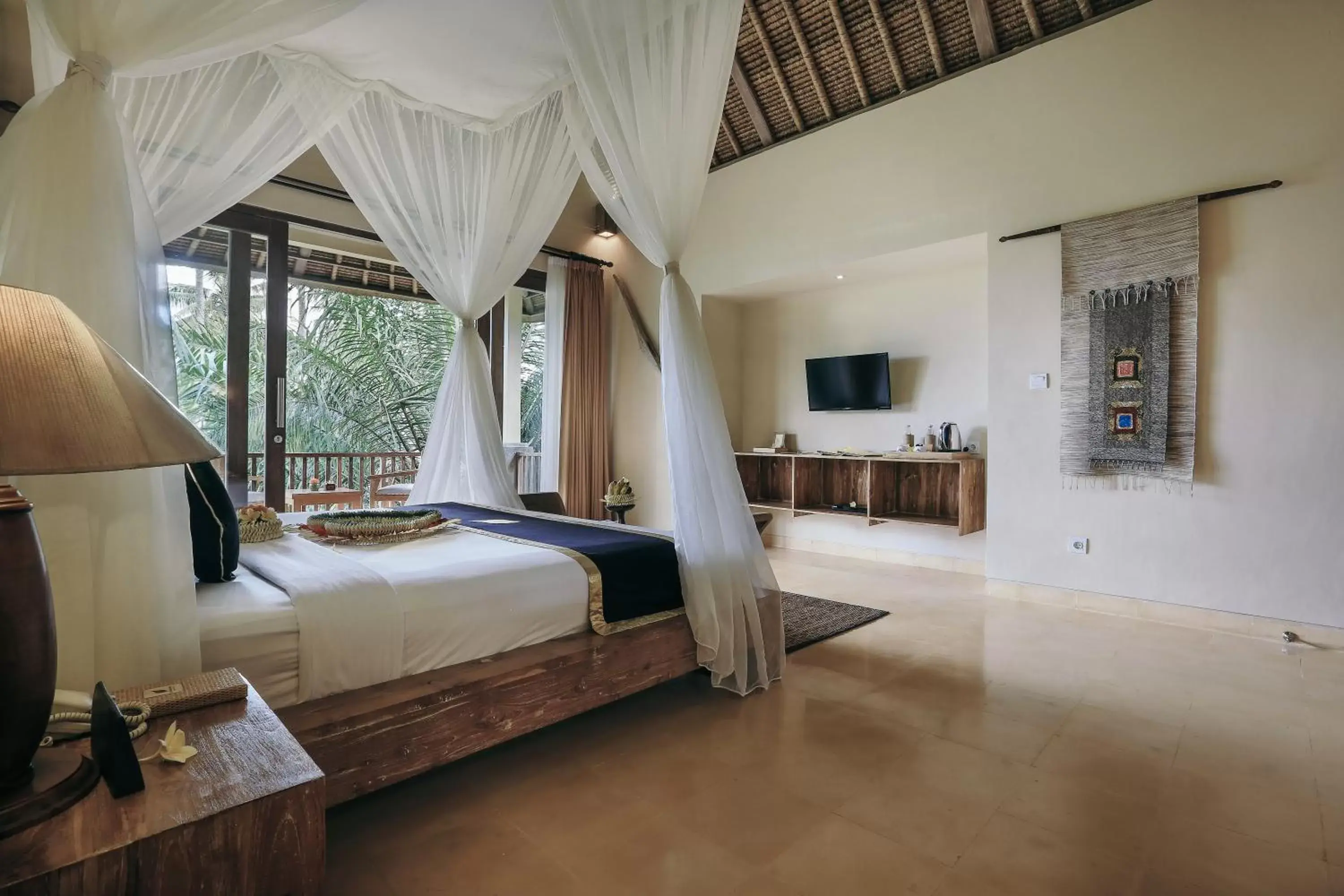 Bed in The Sankara Resort by Pramana