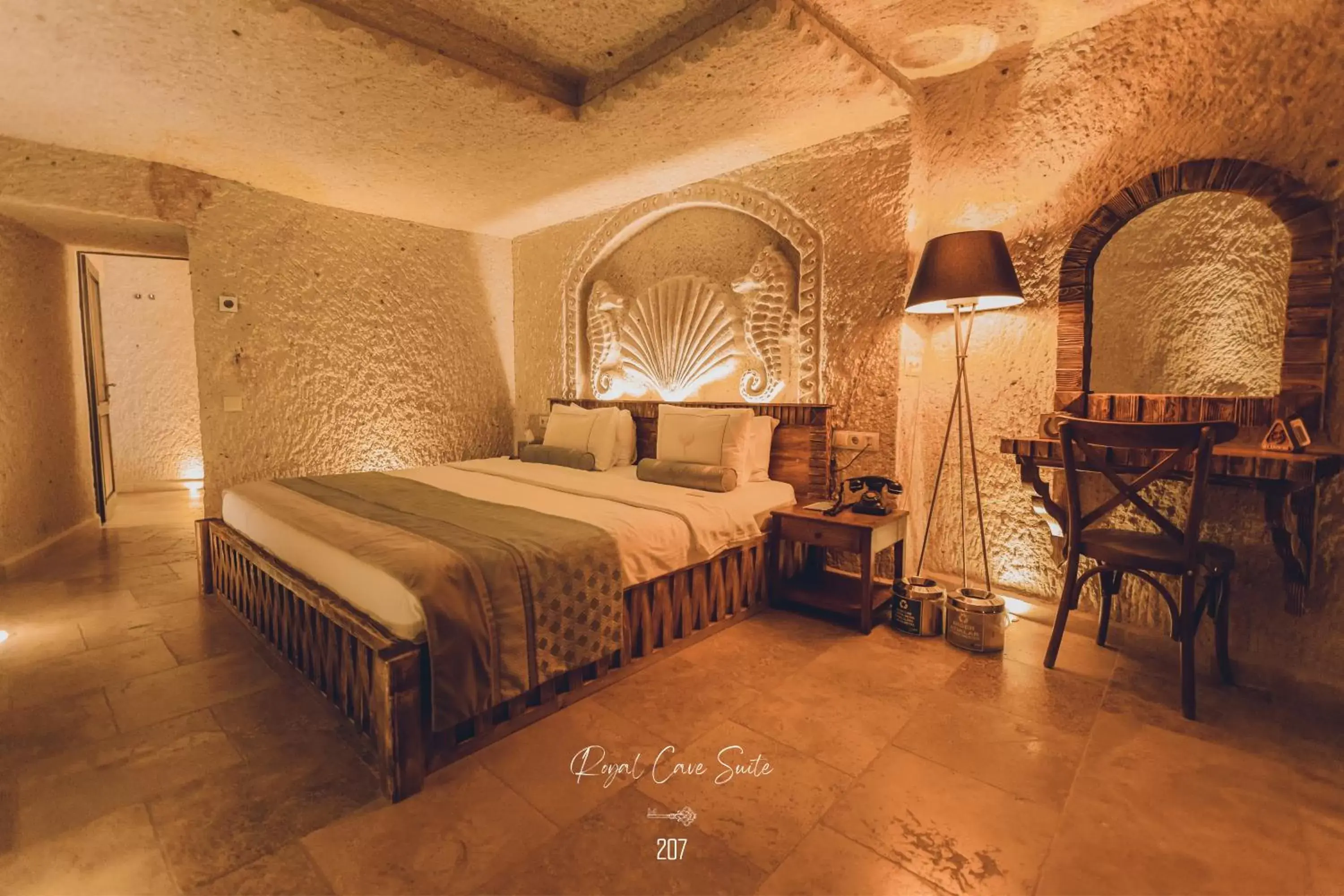 Bed in Nino Cave Suites