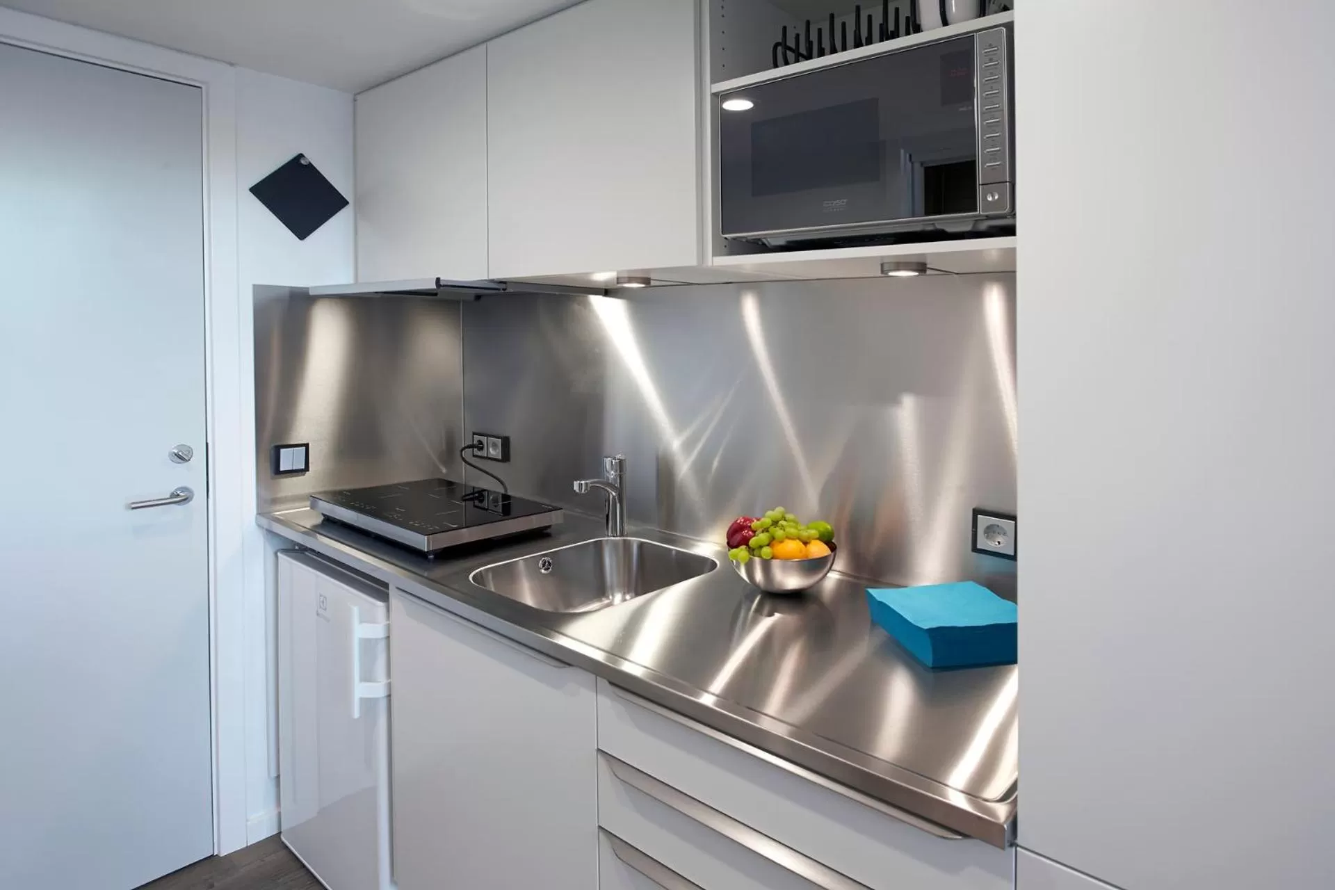 Kitchen or kitchenette in Living Suites