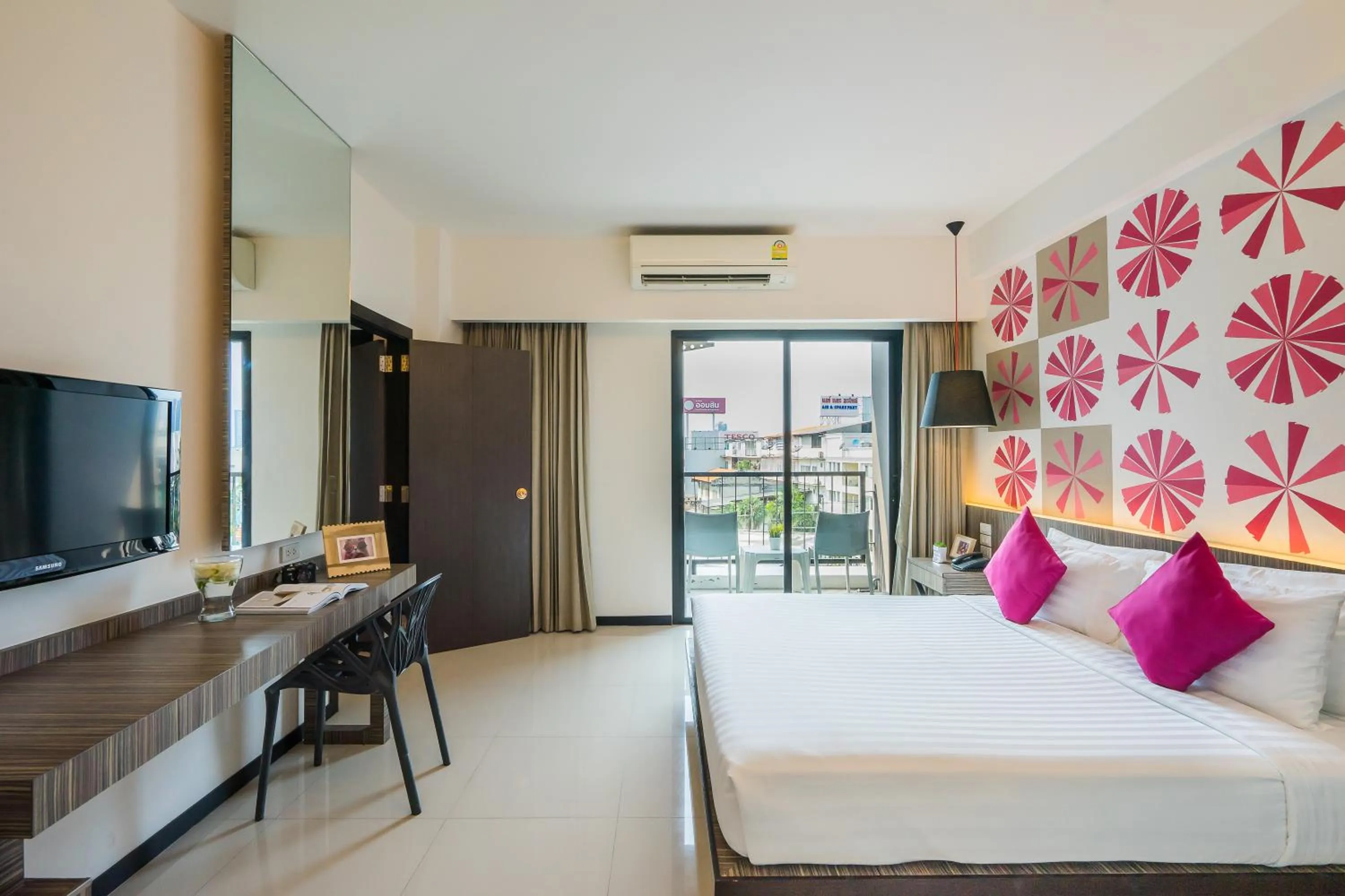 Bed in Hotel J Residence Pattaya