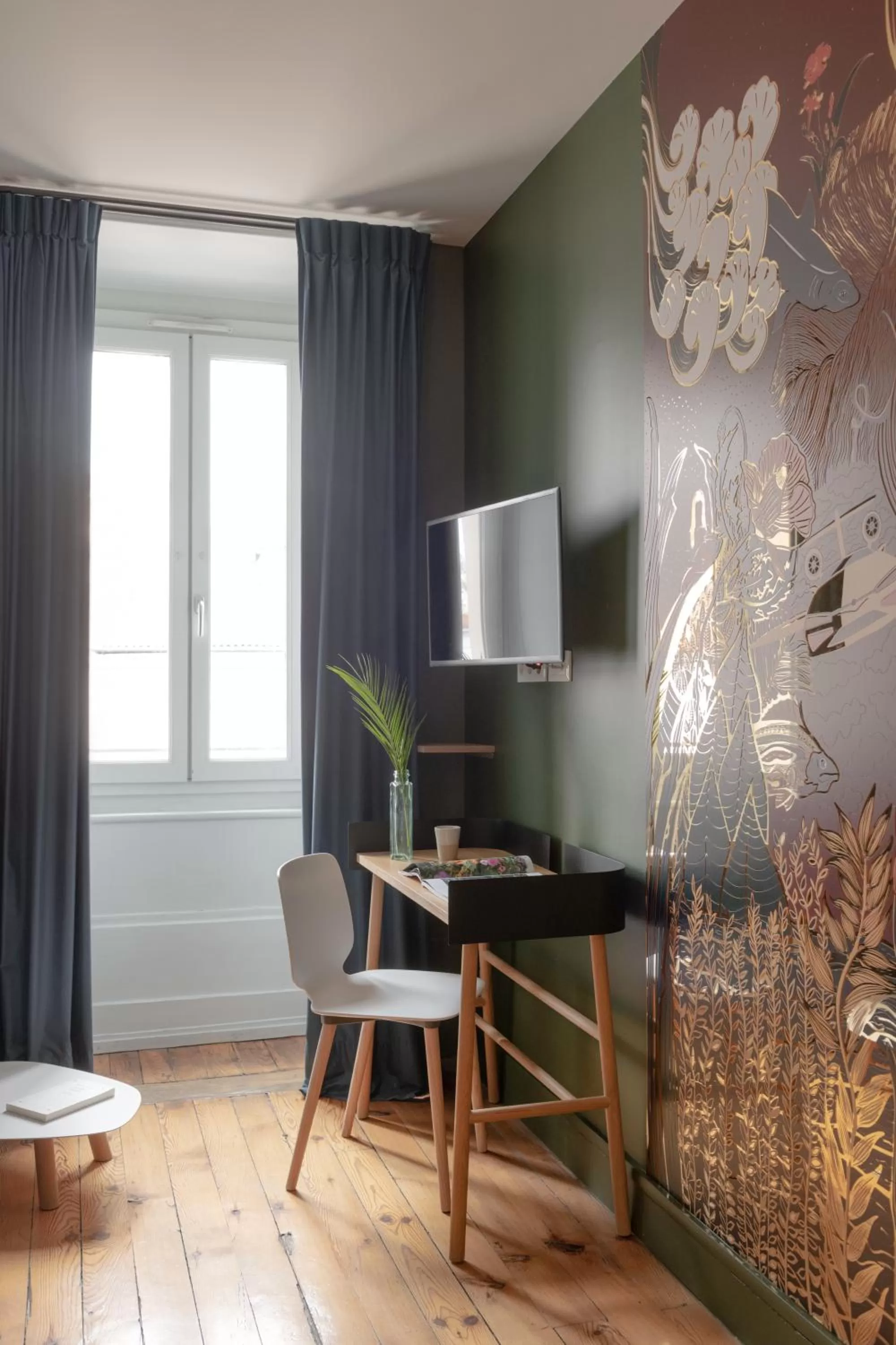 TV/Entertainment Center in MiHotel Gailleton