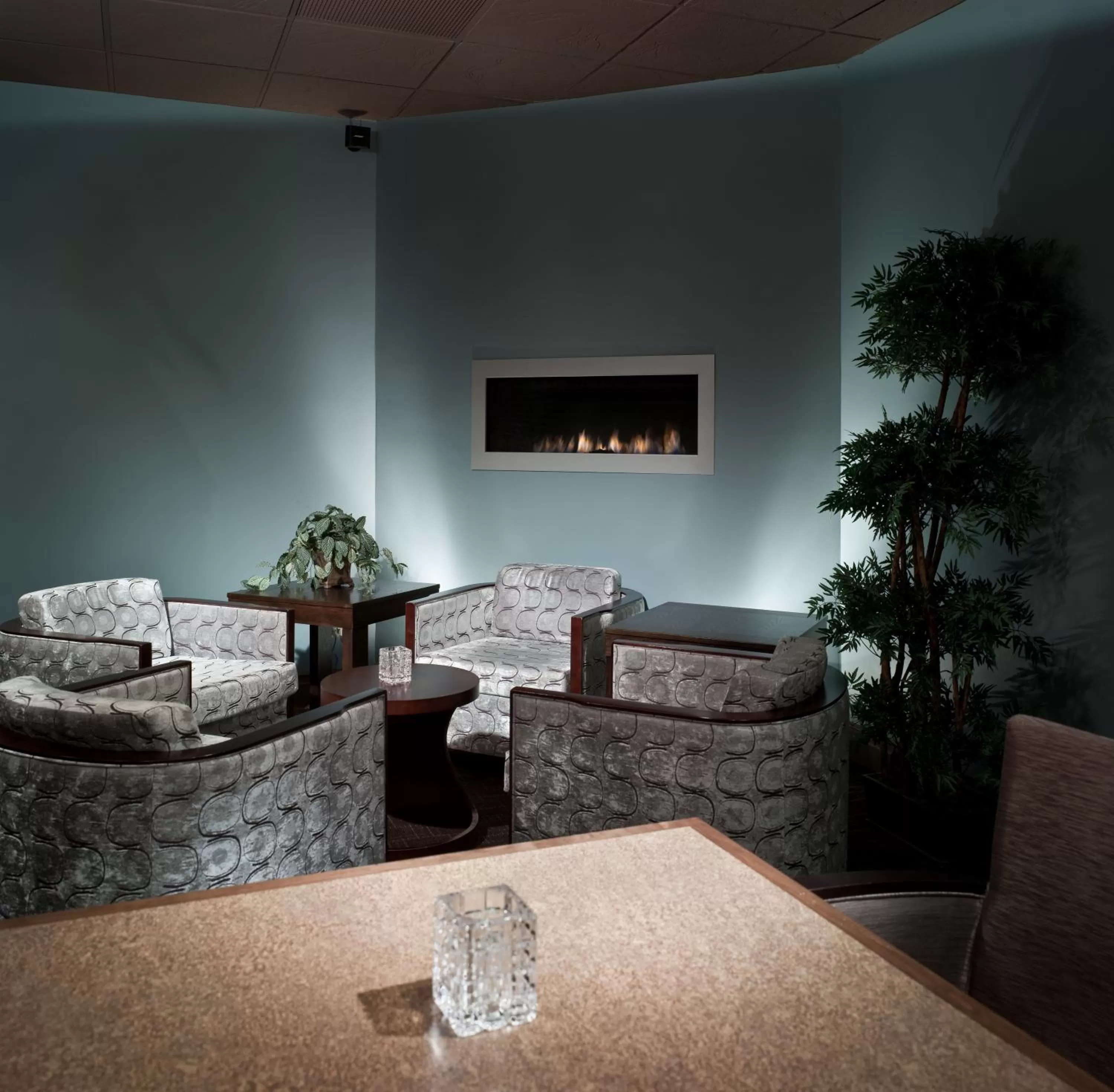 Communal lounge/ TV room in The Madison Concourse Hotel