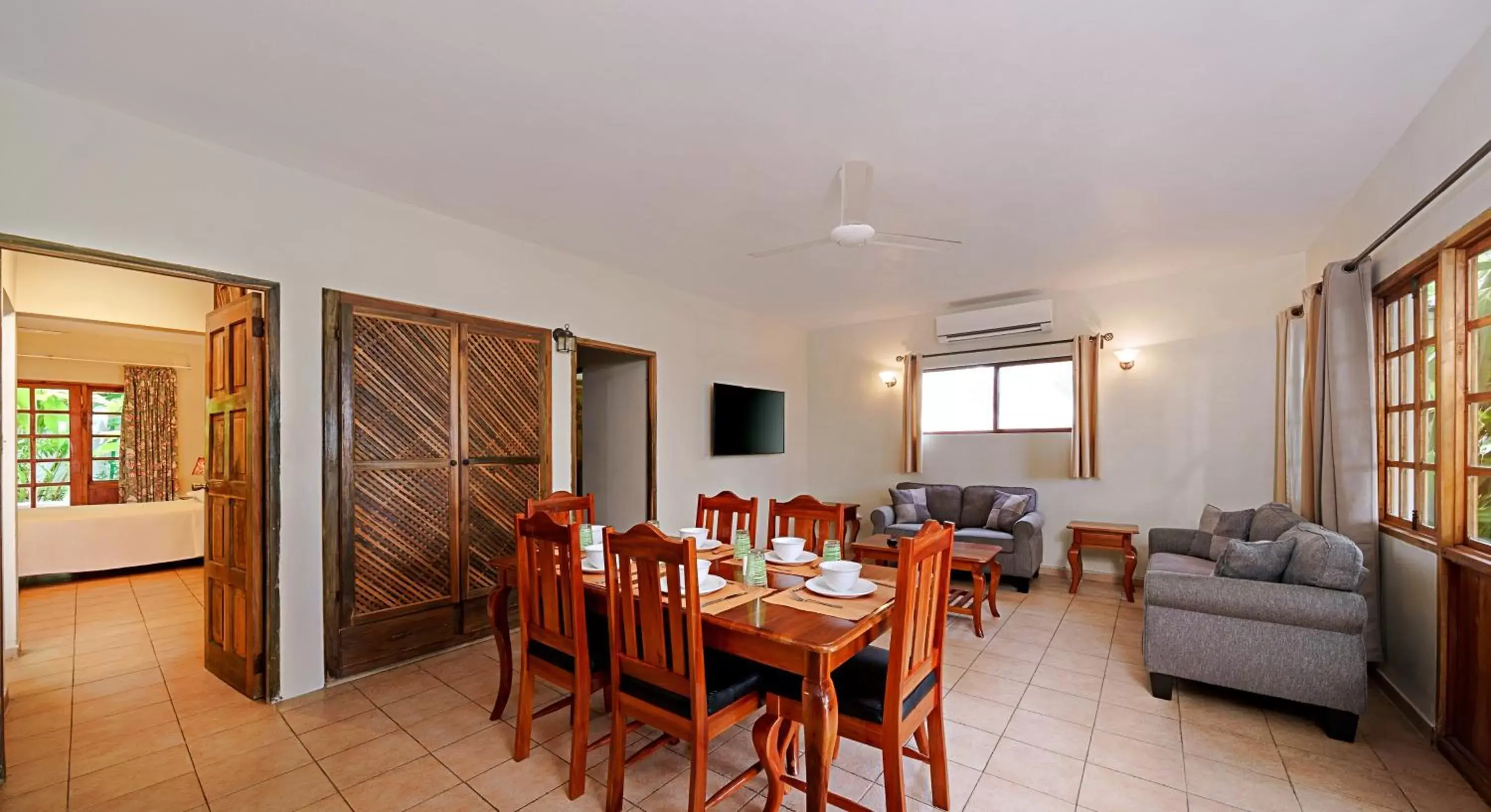 Living room, Dining Area in Beach House Condos, Negril