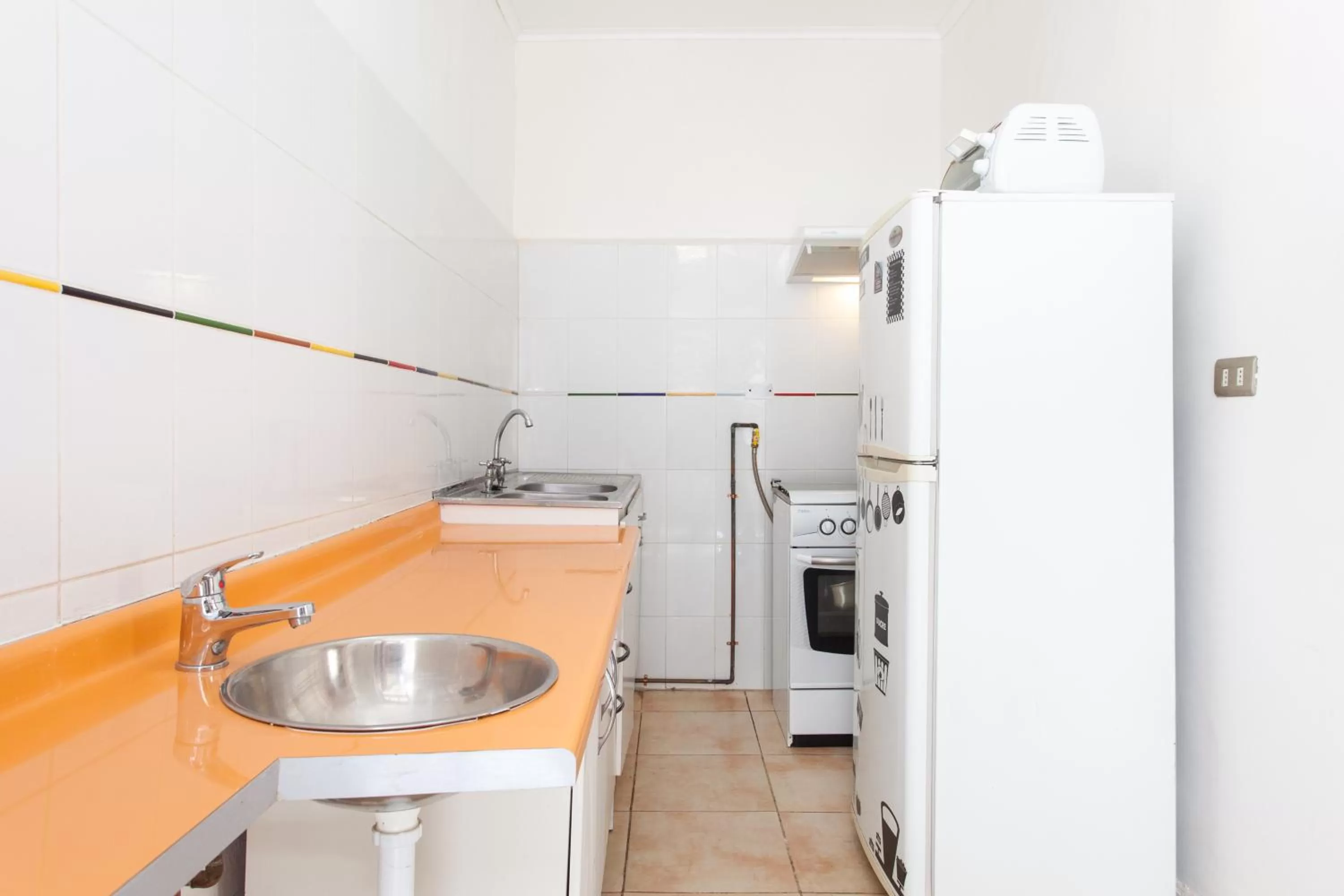 Kitchen or kitchenette in Italia Suite