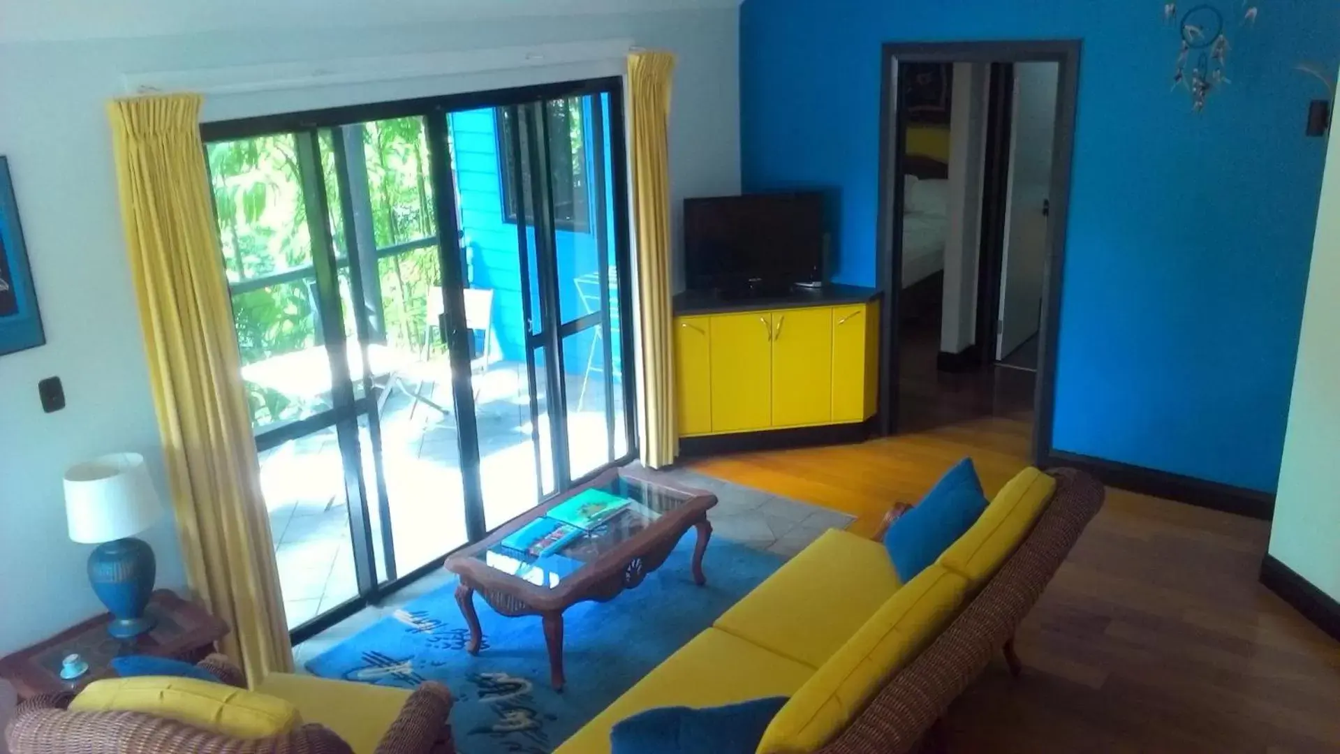 Living room, TV/Entertainment Center in Dreamcatcher Beach-Side Apartments