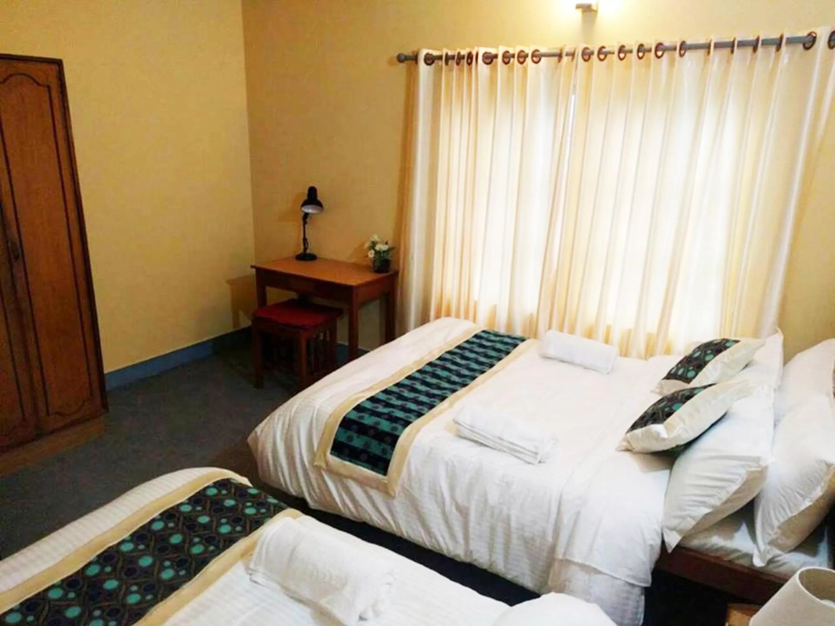 Bed in Hotel Nana Pokhara