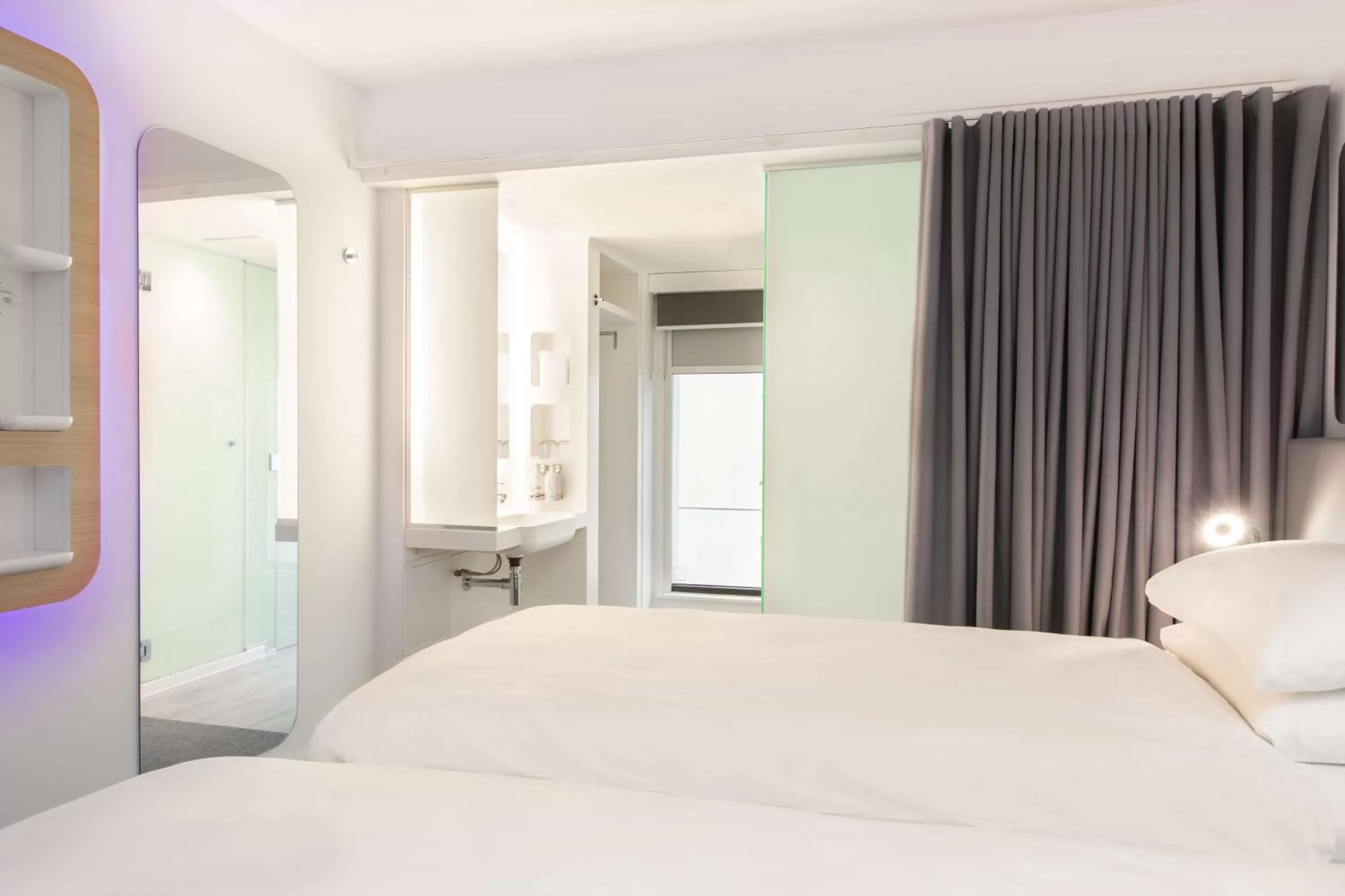 Photo of the whole room, Bed in YOTEL Edinburgh