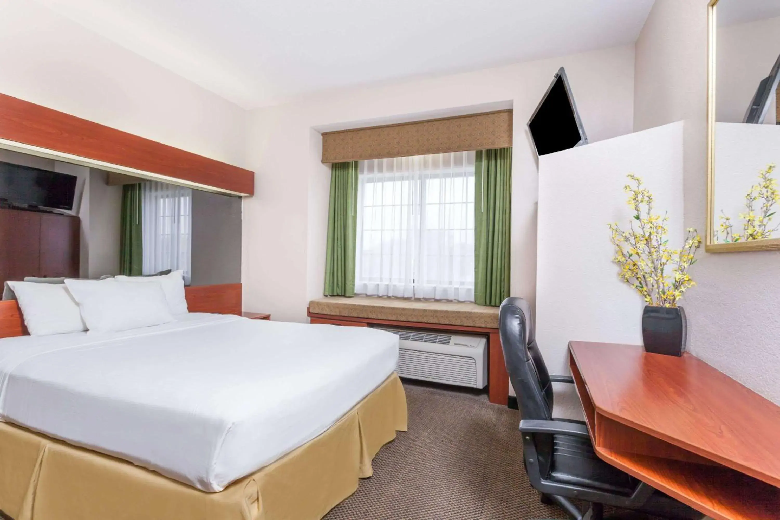 Photo of the whole room in Days Inn by Wyndham near Kansas Speedway