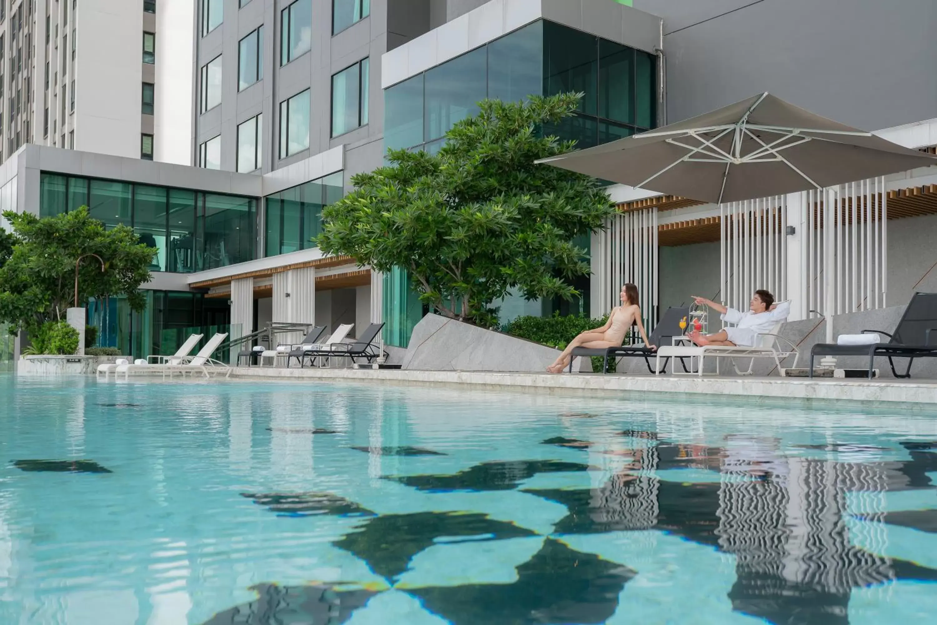 Property building, Swimming Pool in Holiday Inn & Suites Siracha Laemchabang, an IHG Hotel
